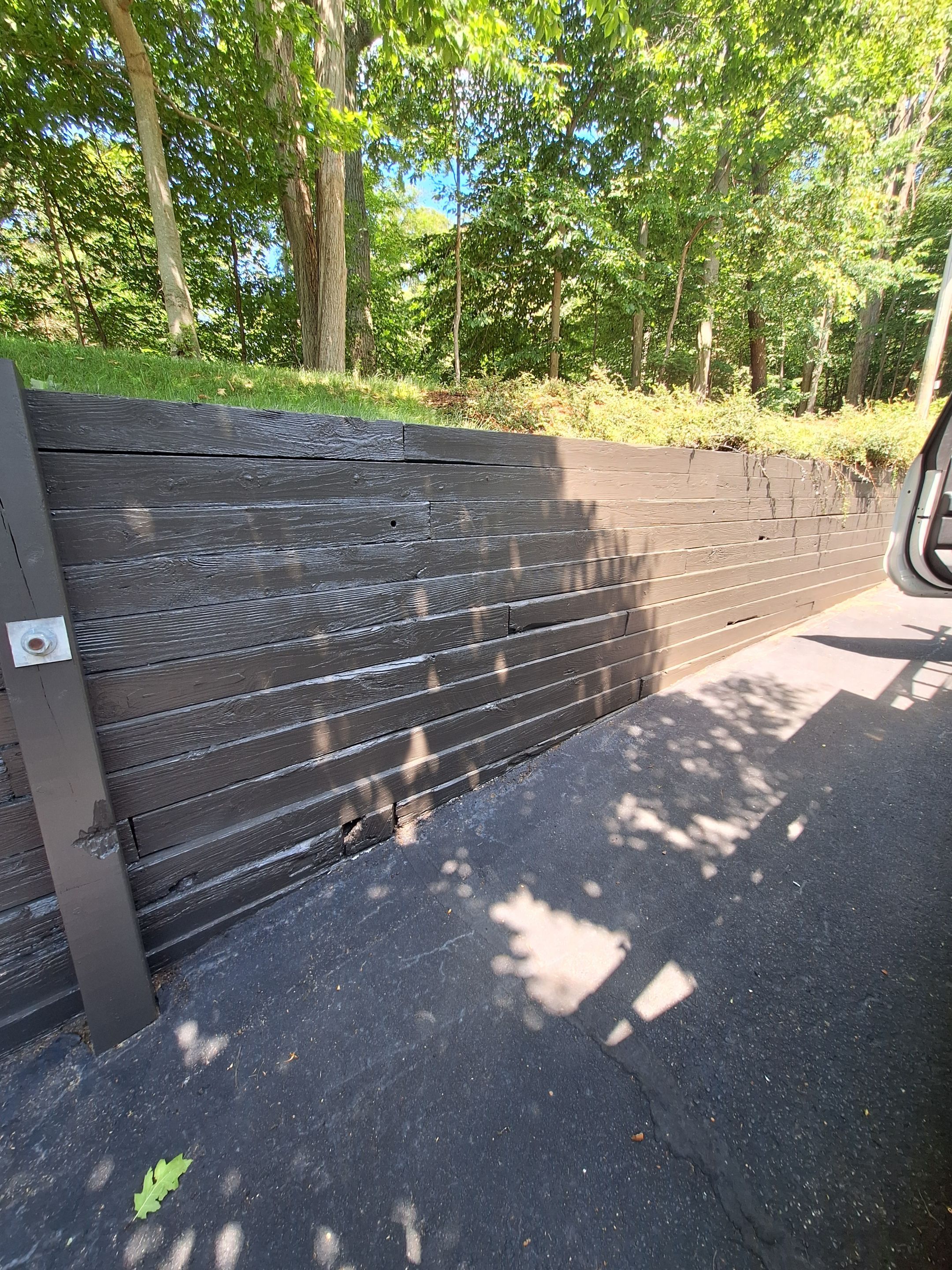 Exterior Retaining Wall Painting | Grand Haven, Michigan by Gordon Painting