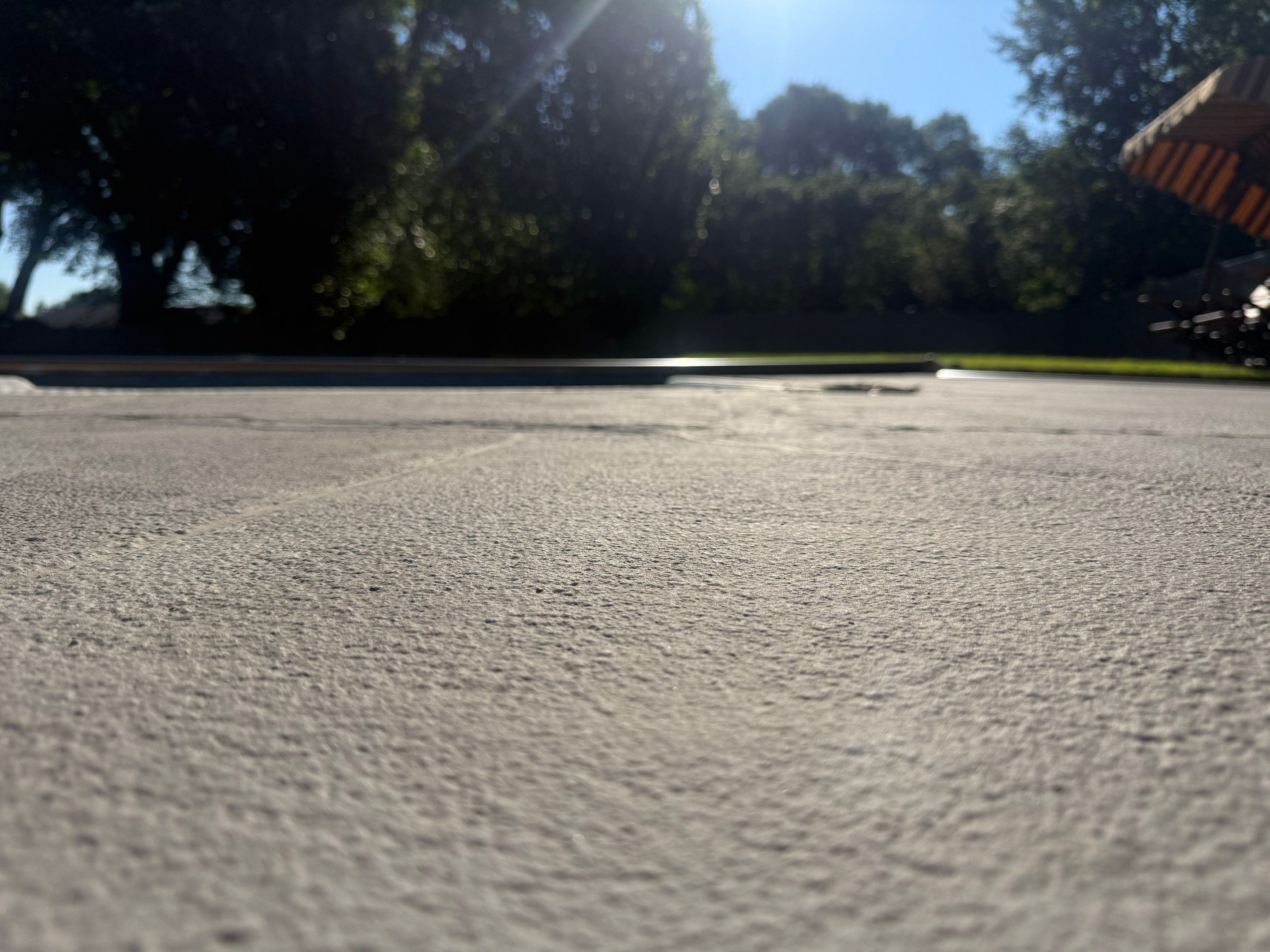 Residential Pool Deck Resurfacing in Sioux Falls by Select Painting, Coatings & Garage Cabinets
