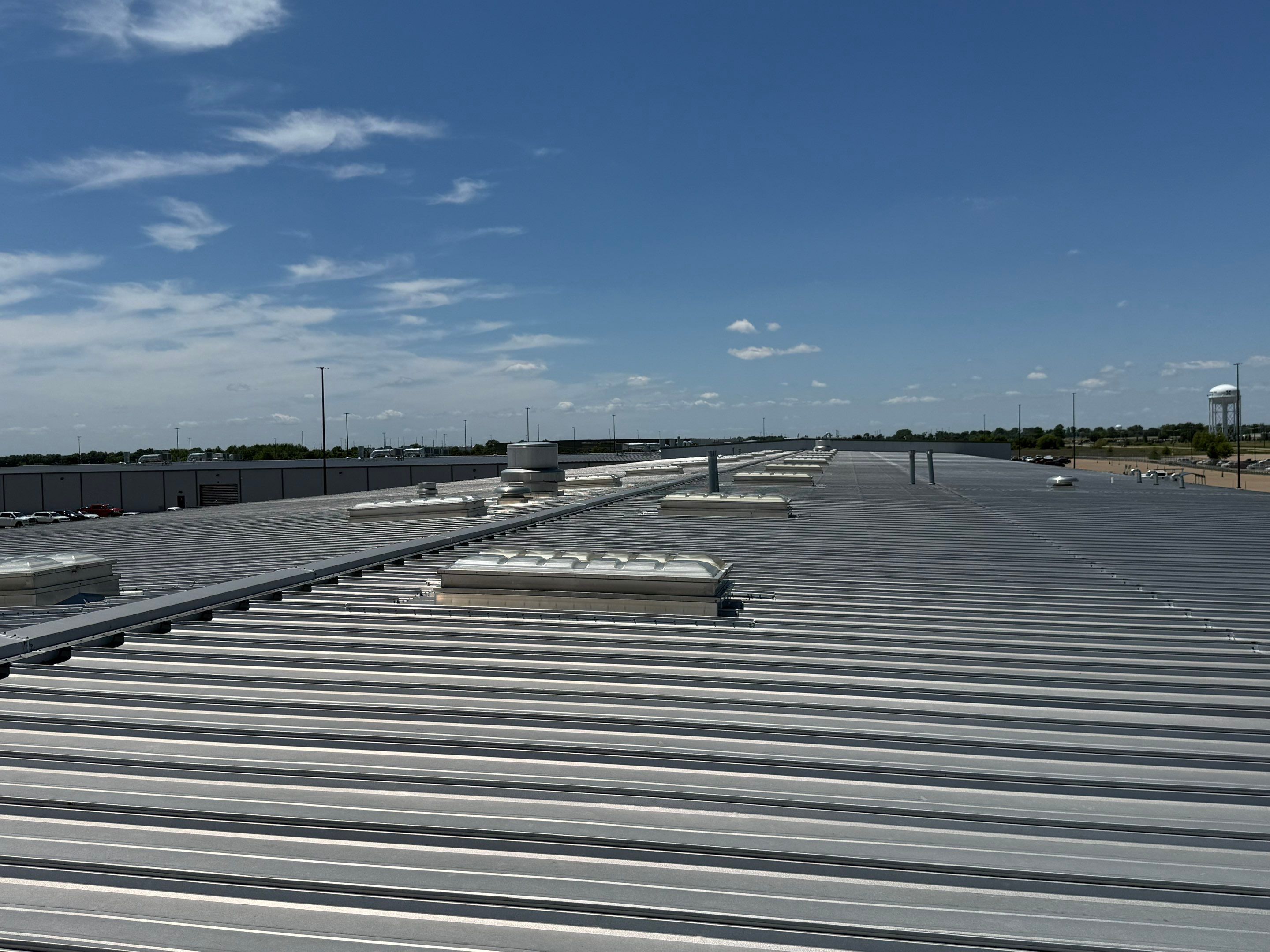 Commercial Metal Roof Repair and Skylight Sealing in West Memphis by Revival Roofing Services