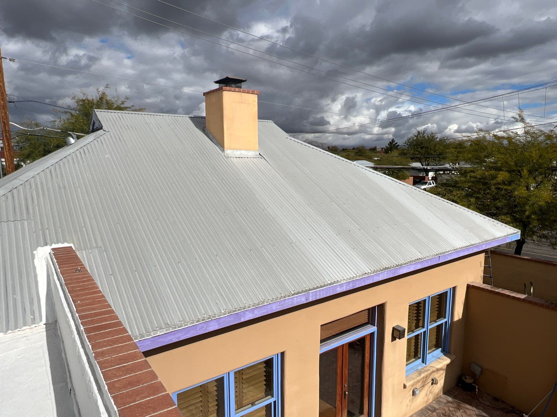 Metallic Silver Exposed Fastener by Reimagine Roofing