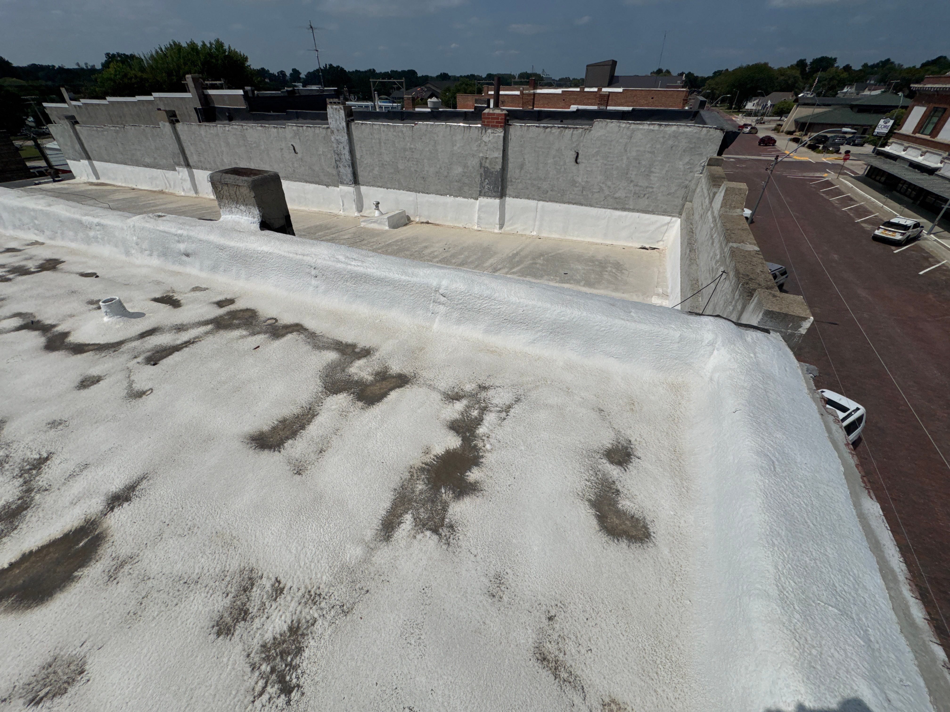Commercial Flat Roof Elastomeric Coating and Repair in West Point by Crows Roofing LLC