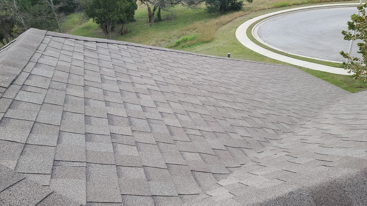 Residential Roof Replacement with Oakridge Asphalt Shingles in Leander by Caliber Restoration LLC