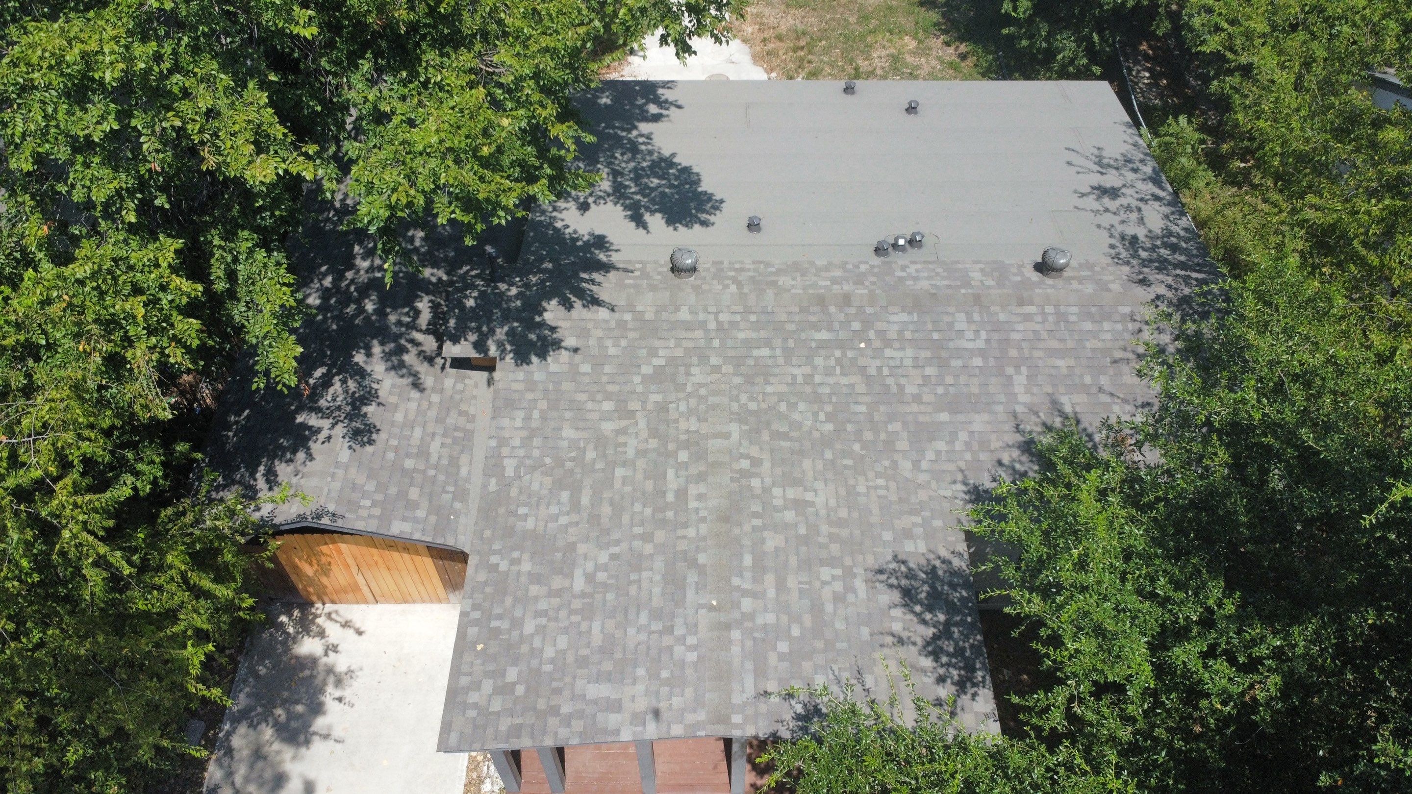 Mixed Roof System – Oakridge Driftwood + Flat Roof Section | Austin, TX by Kstylez Roofing & Construction