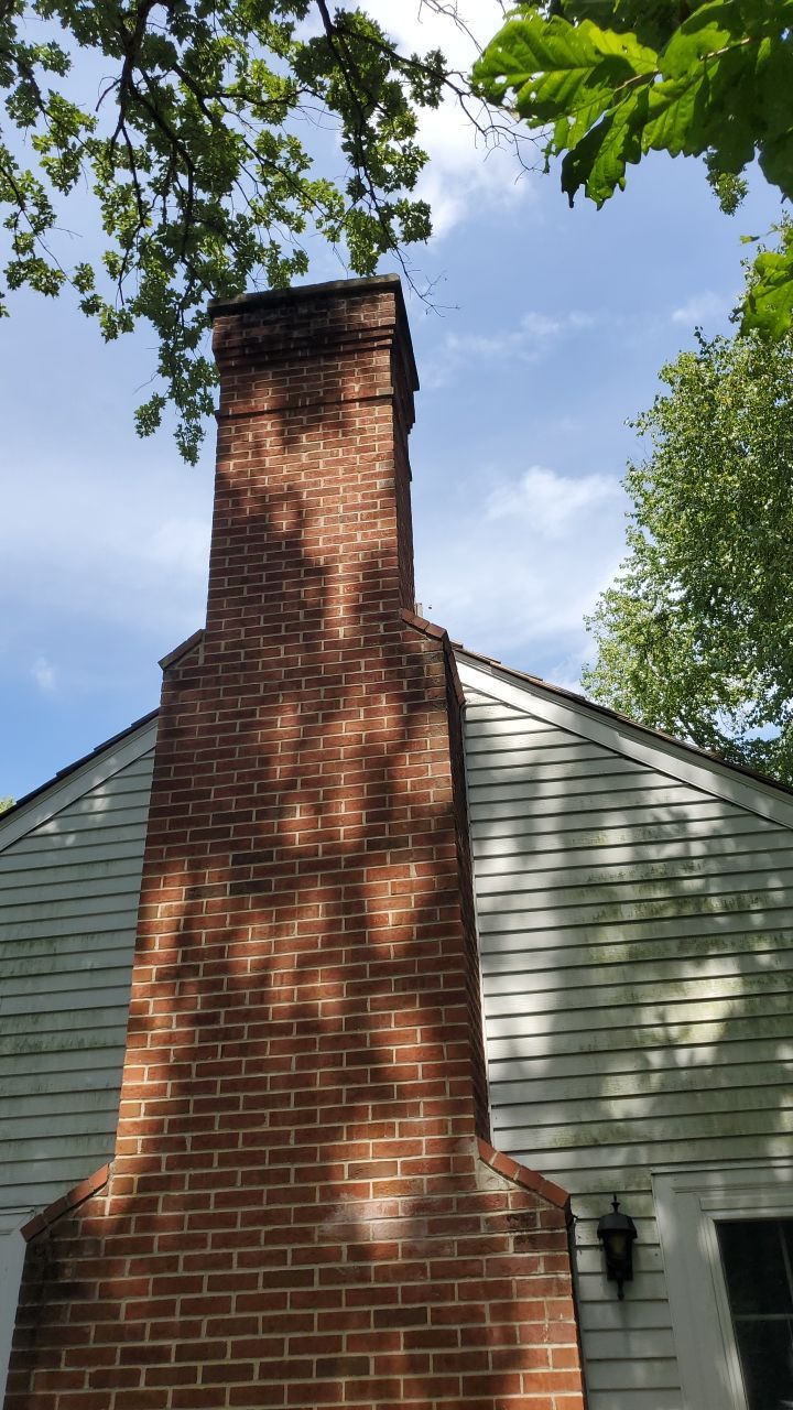 Housewashing  using Algaecide, soft wash soap by Northern Power Washing LLC.
