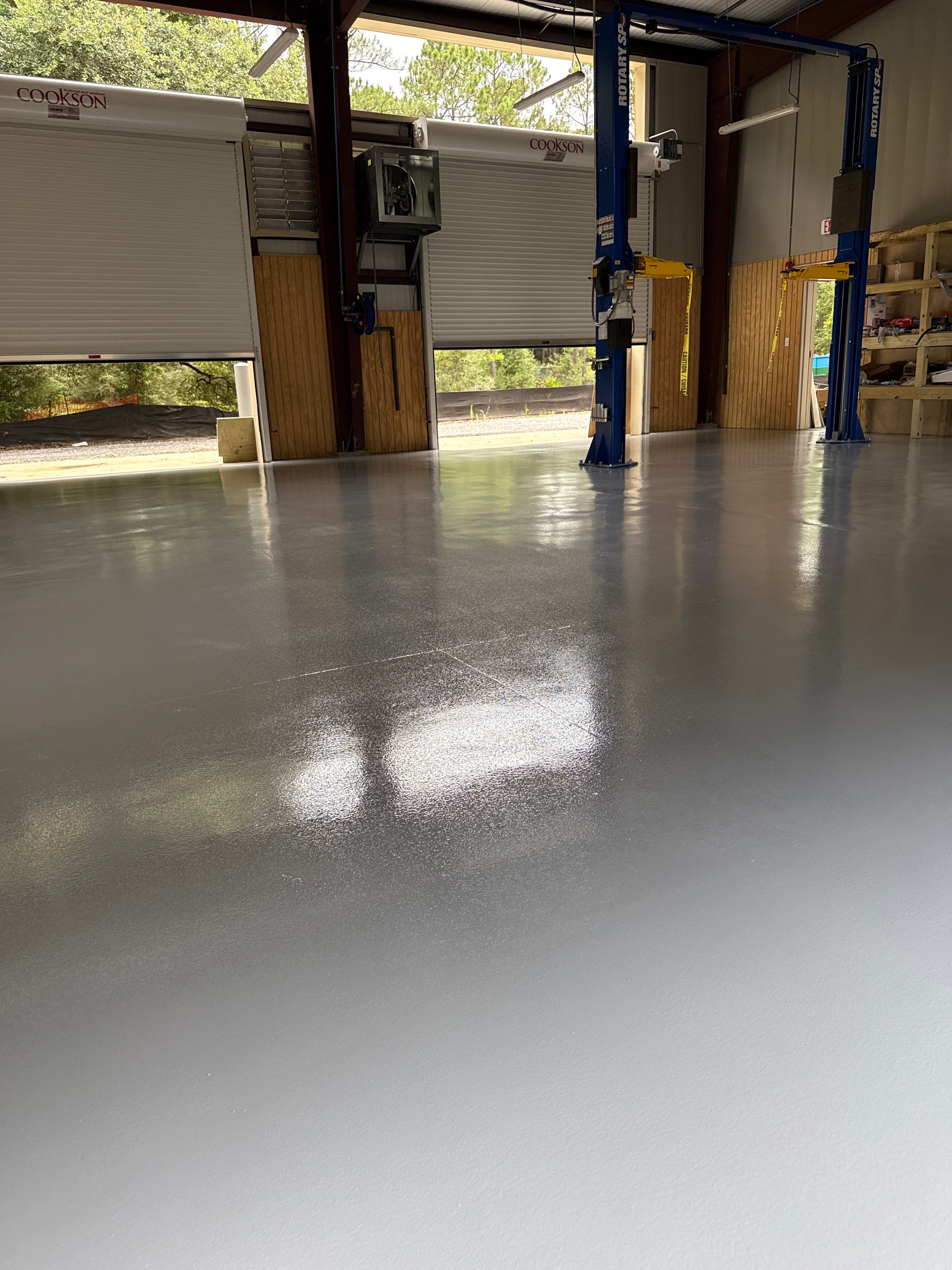 Industrial Epoxy Flooring for Sandhill Crane Workshop in Gautier by Cornerstone Hard Surface Restoration 