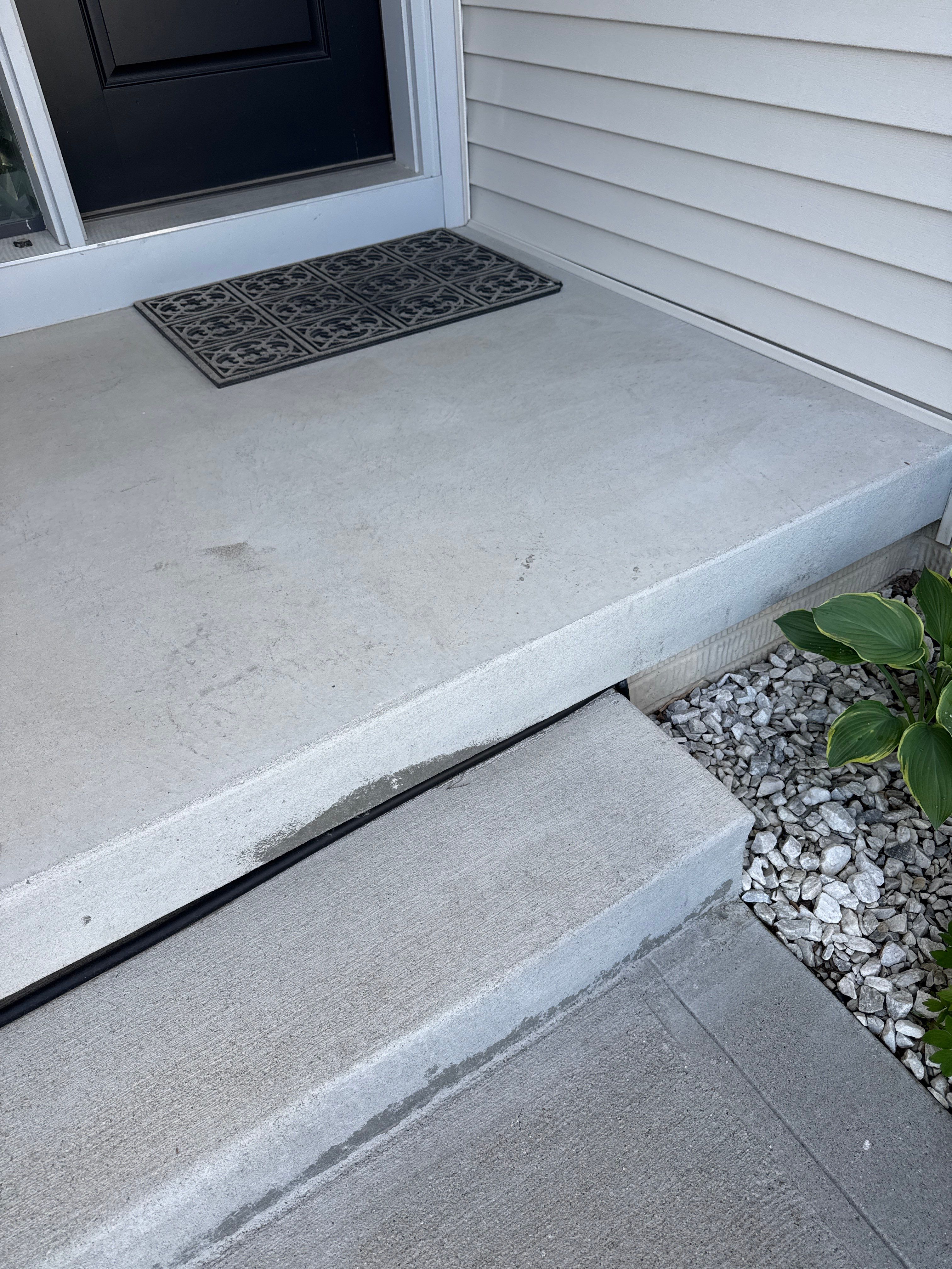 Residential Garage and Front Entry Concrete Coating in Nevada, Iowa by Revival Concrete Coatings