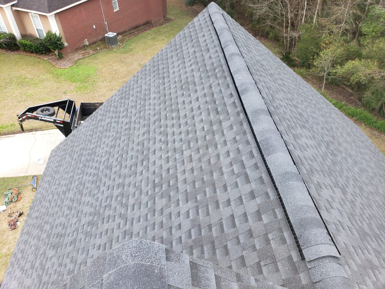 Residential Roofing Installation using Roof Replacement by American Roofing & Construction LLC