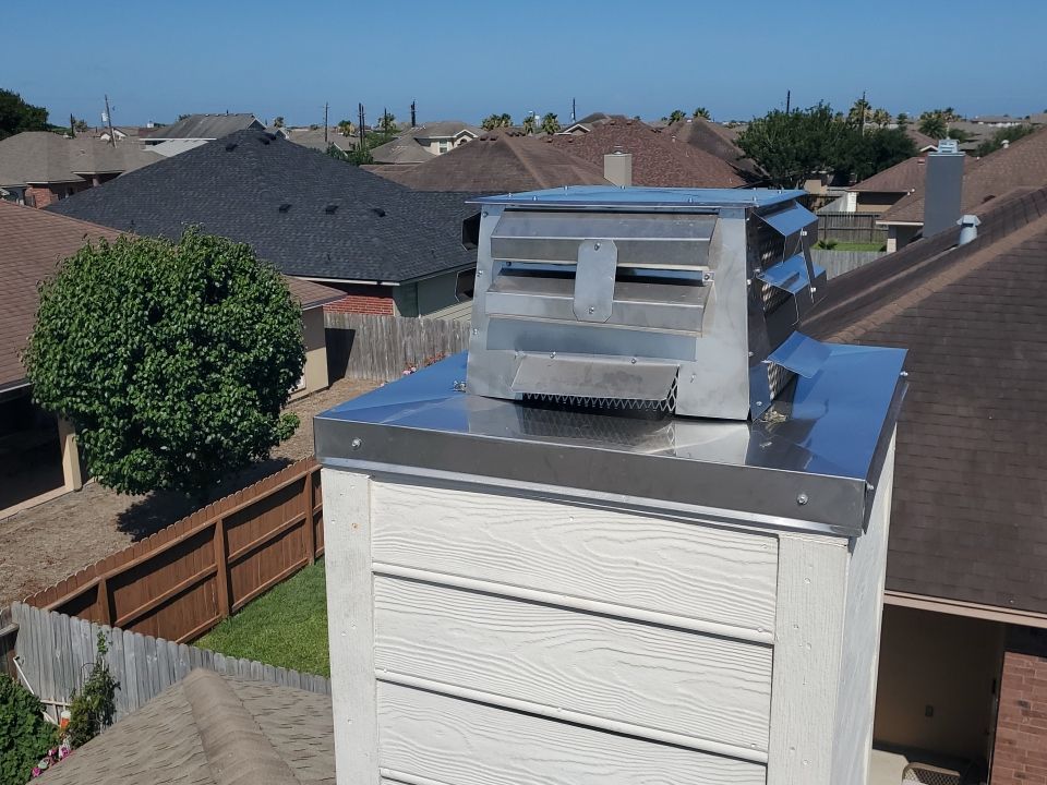Chimney Cap Replacement using Custom Fabricated Stainless Steel by Lighthouse Roofing