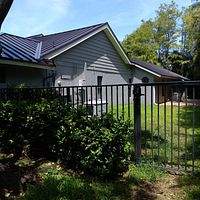 24ga 1.5" Mechanical Seam Dark Bronze by Total Roofing System The Metal Roof Experts