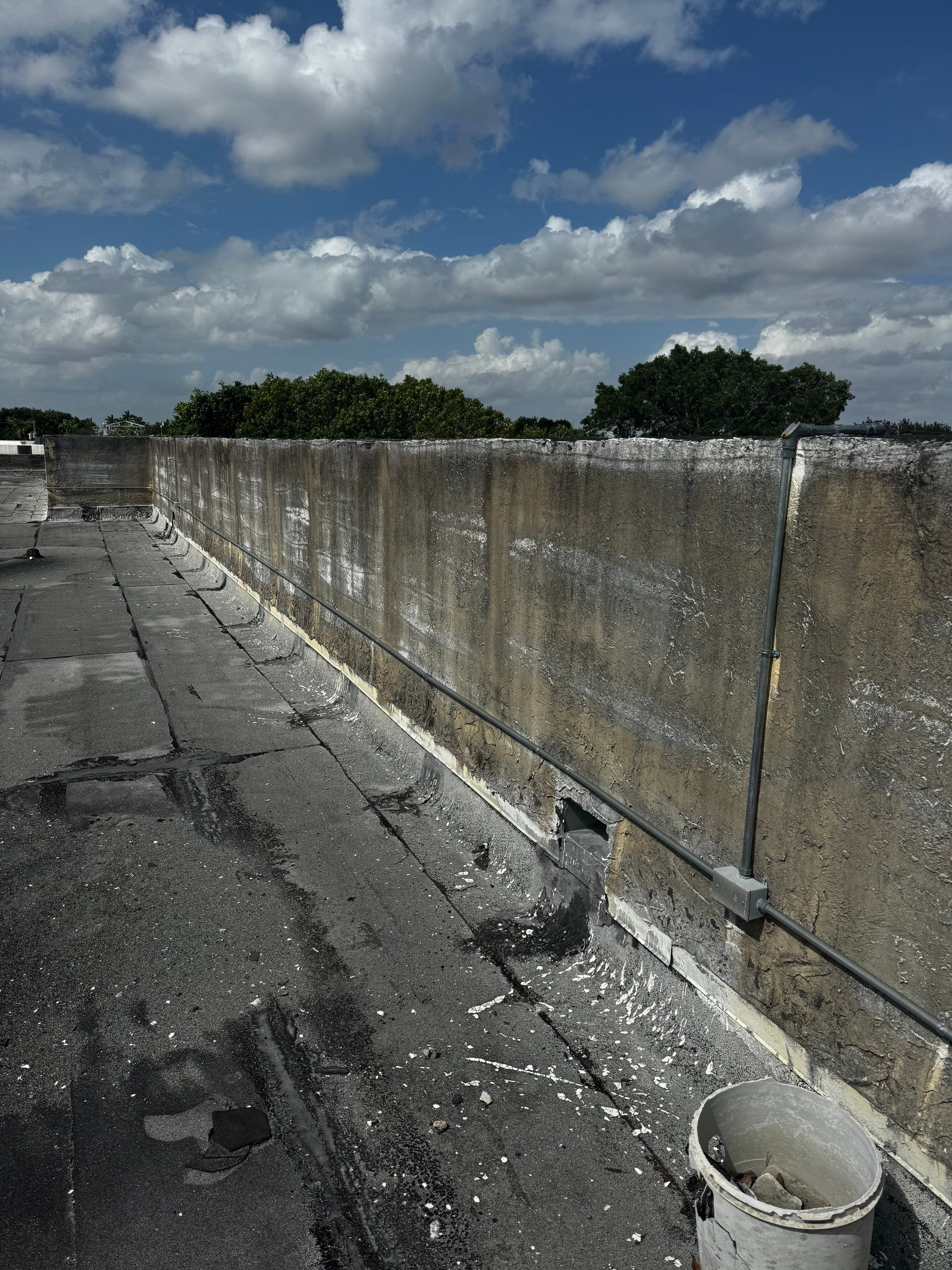 White TPO Membrane Roof Replacement at Doral Commercial Building by AJF ROOFING INC
