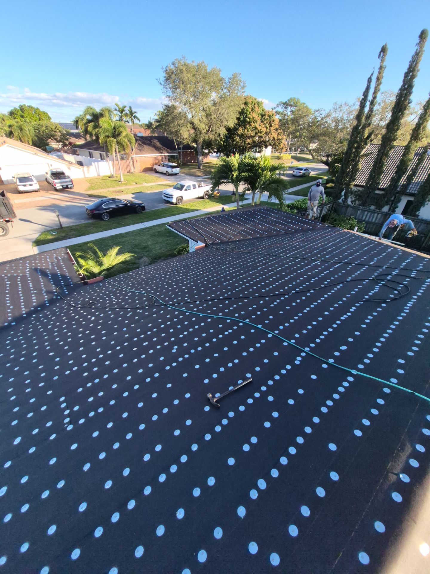 Residential Roofing Installation using 1" Nail strip metal roof by BLUES BROTHERS ROOFING