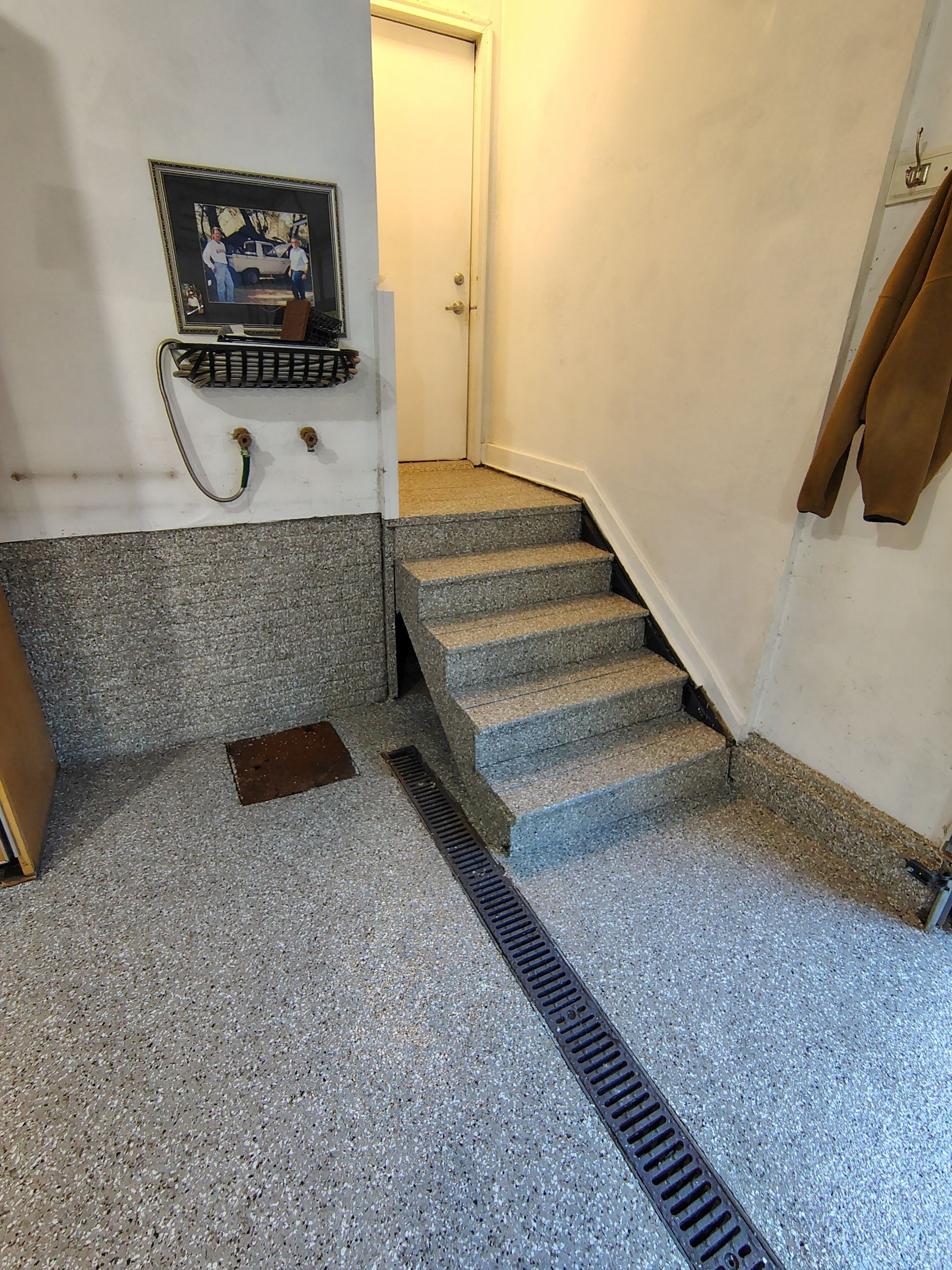 Garage Floor and Entry Step Concrete Coating in Sioux Falls by Select Painting, Coatings & Garage Cabinets