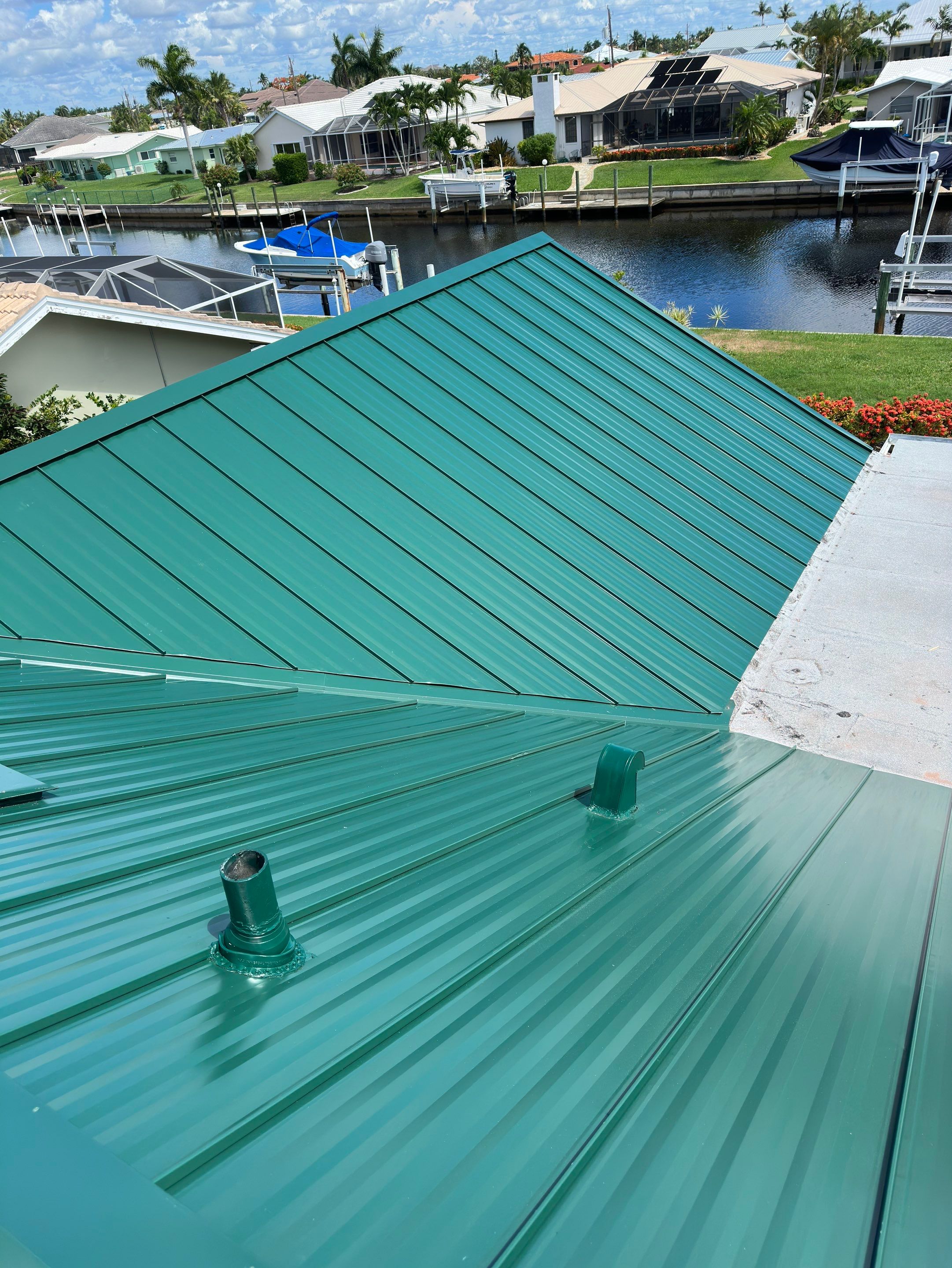 Residential Roofing Installation using Gulf Coast Metals Gulf Seam Panels by Four Peaks Roofing