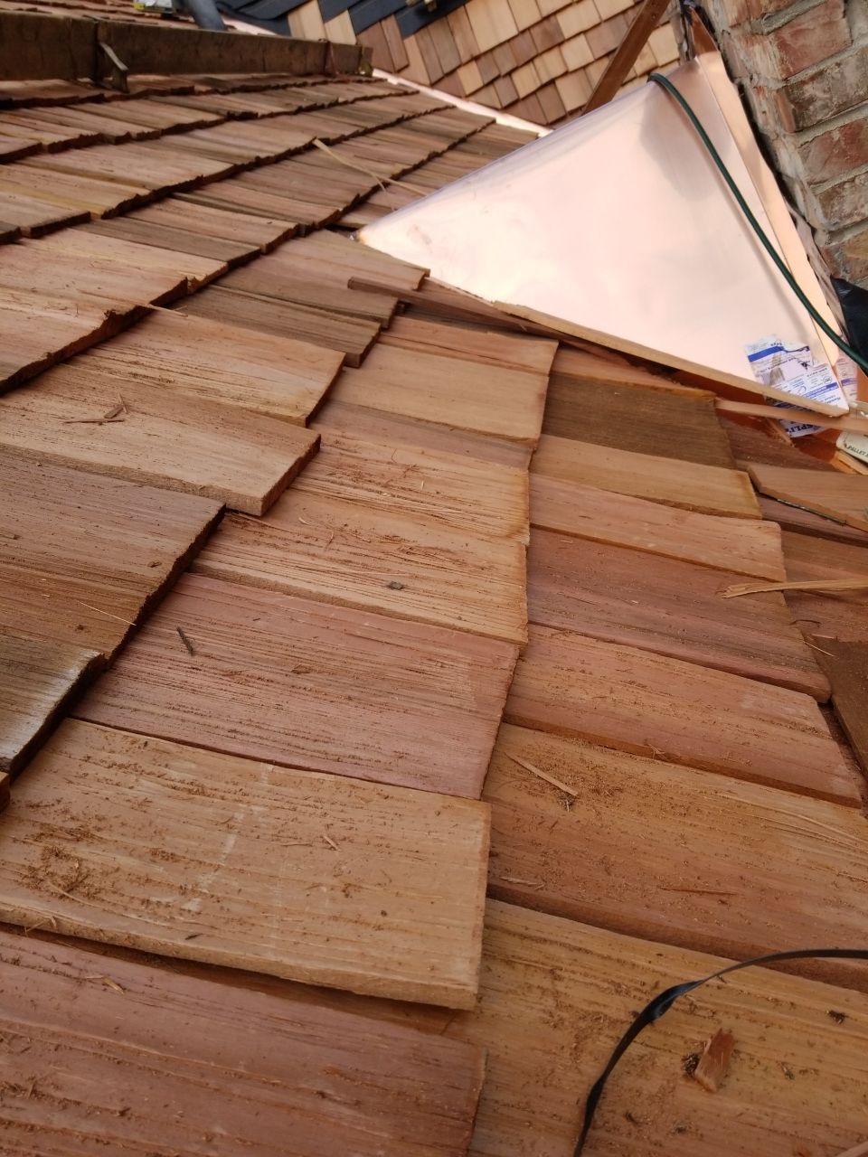 Cedar Roof Installation in Lake Forest by Custom Installations, Inc.