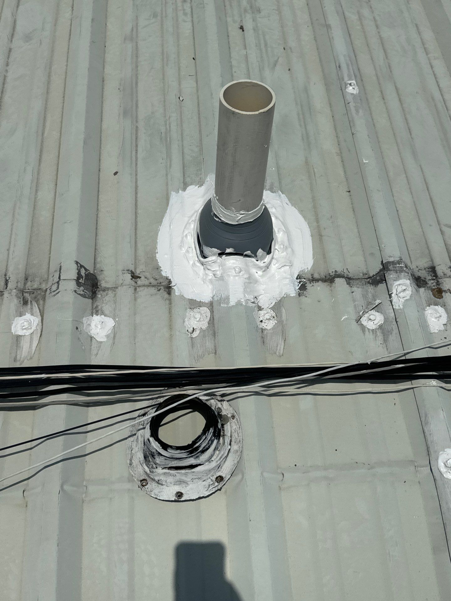 Metal Roof Maintenance- Skylight Installation  by Associates Roofing Unlimited 