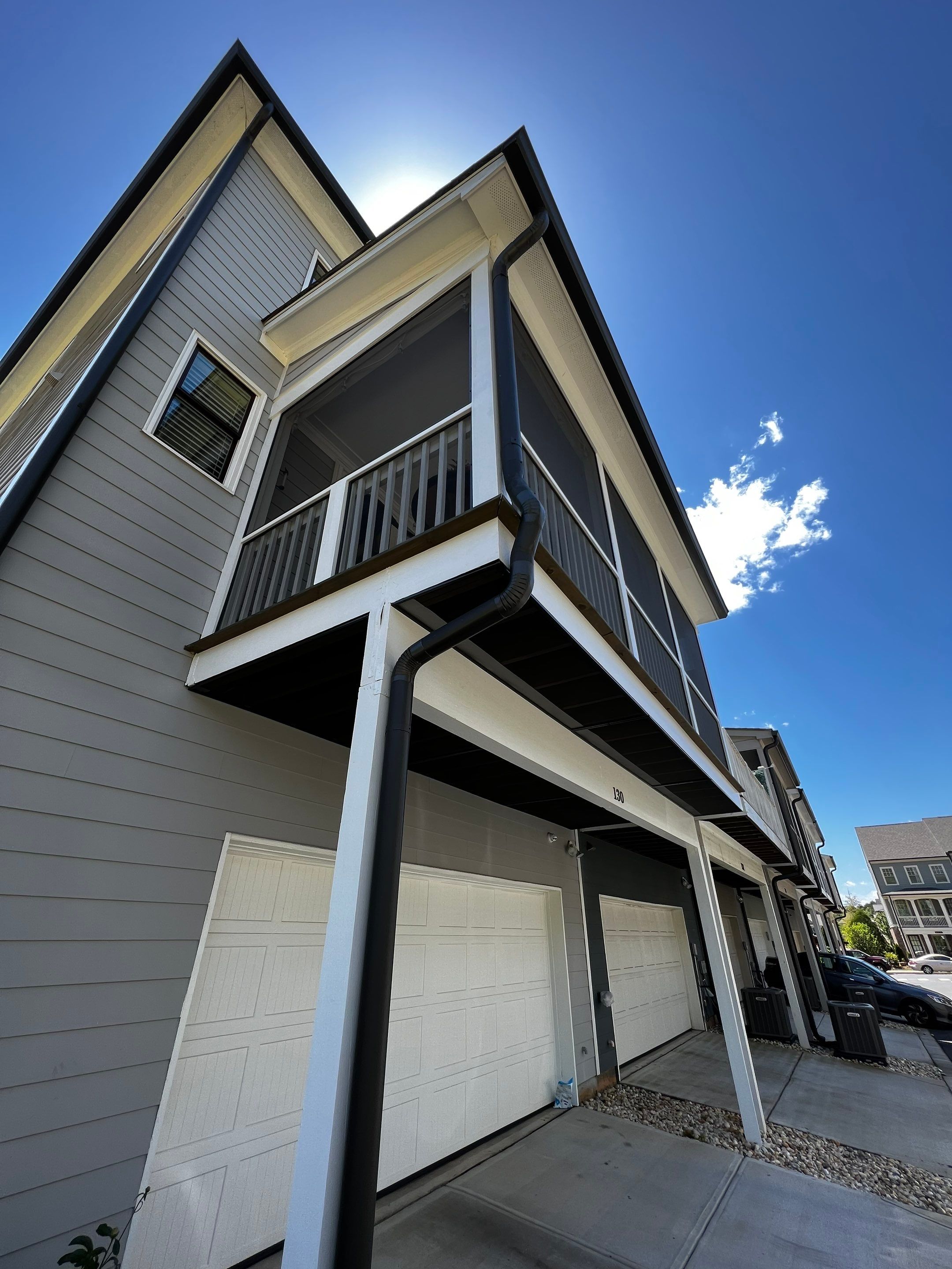 Custom Screened-in Porch Addition Above Garage in Woodstock by Swift Home Renovations