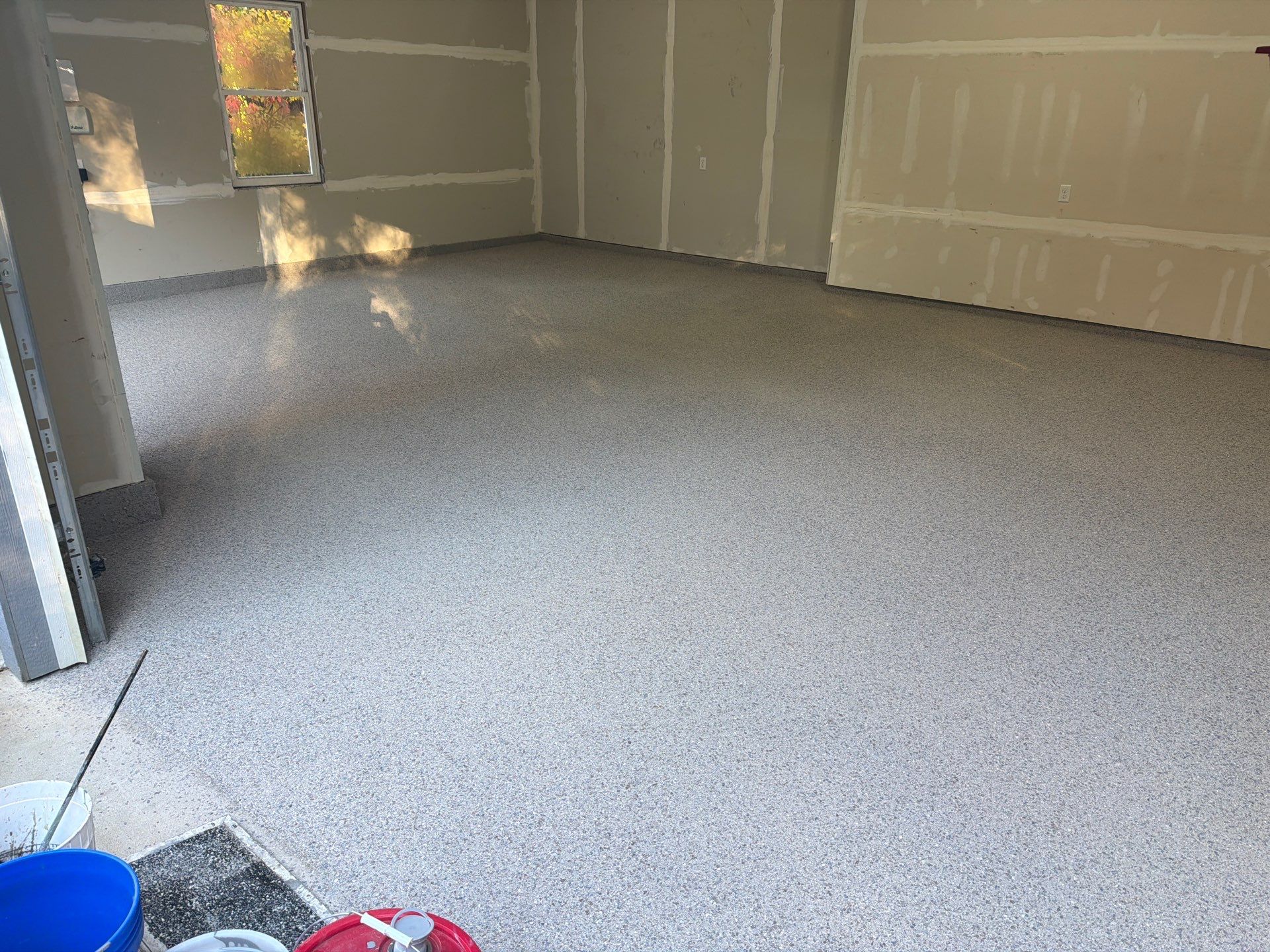 Hudsonville Garage Renovation Featuring Finished Drywall and Flake Epoxy Floors by Gordon Painting
