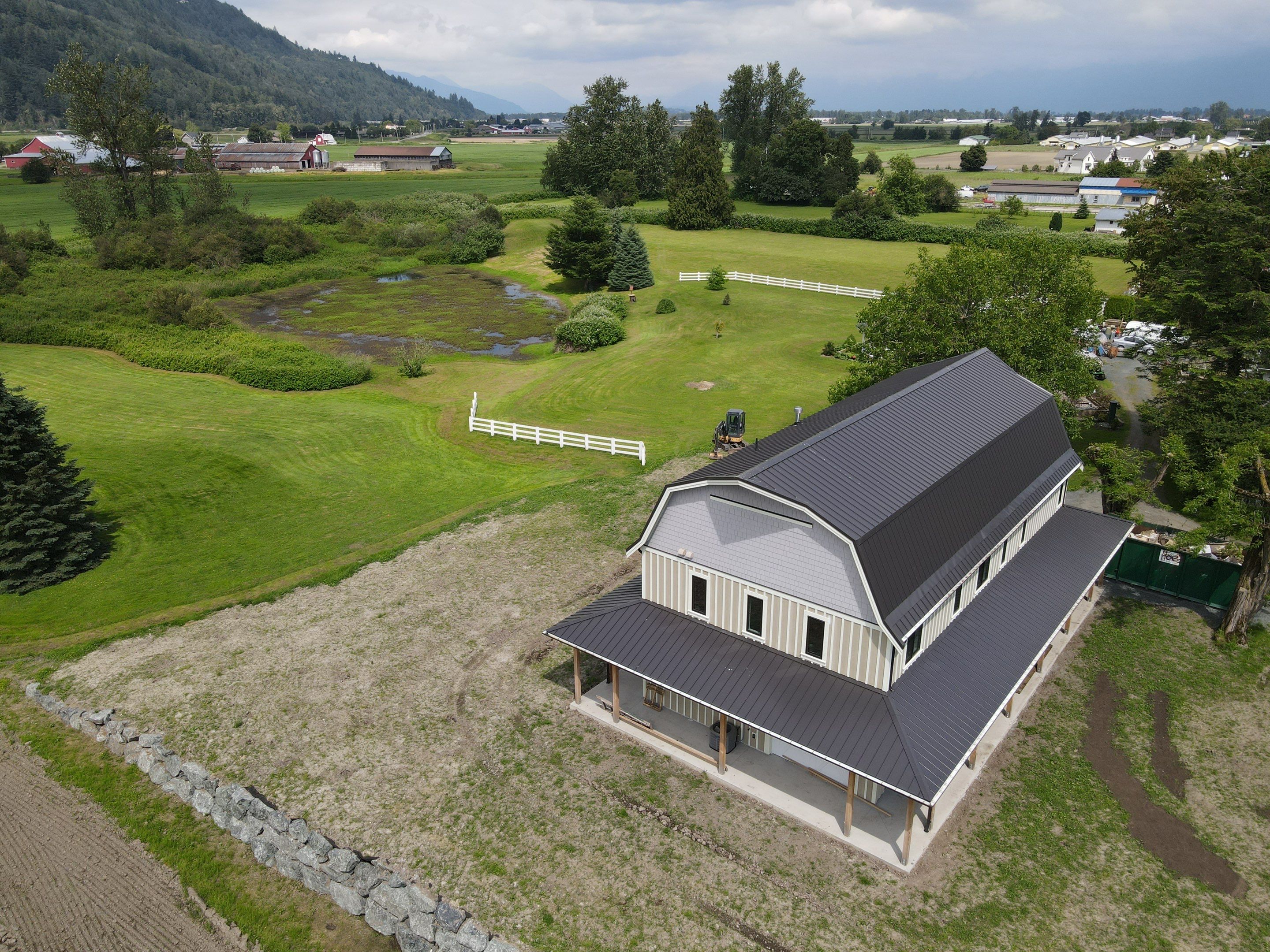 Commercial Roofing Installation using 12" Prolok metal  by Top Notch Roofing Inc
