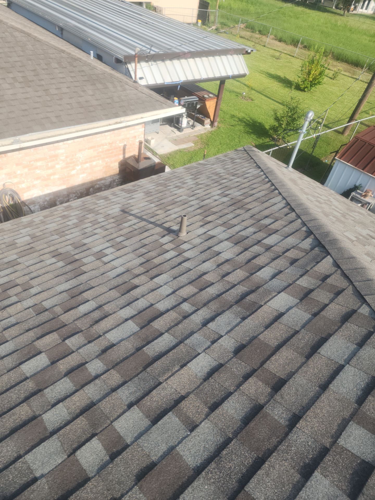 Residential Roofing Installation using Owen's Corning Duration (Lifetime) Shingles by Roof Repair Company
