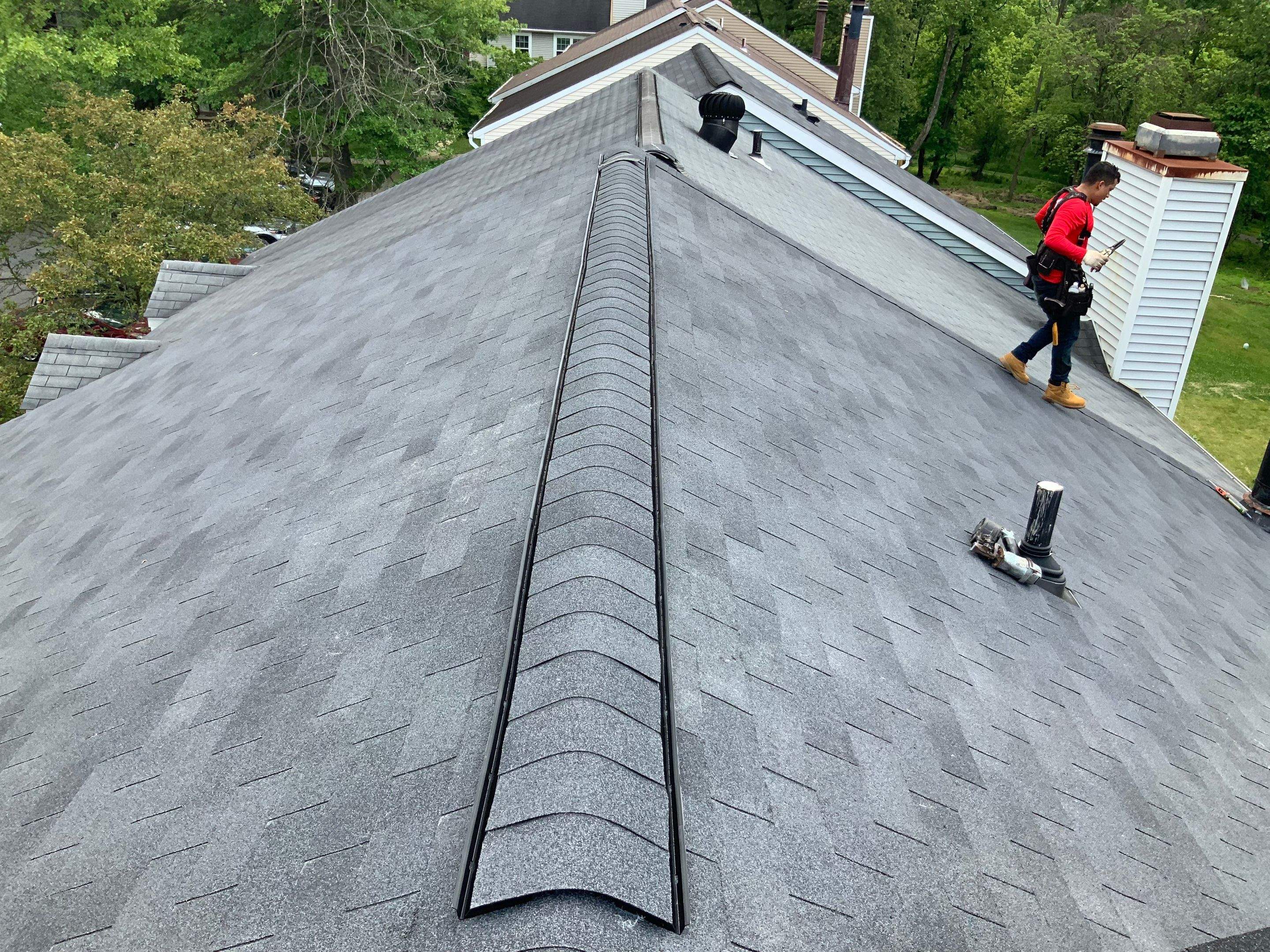 Residential Roofing Installation using XT-25 Color Moire Black by Alpha Design Services