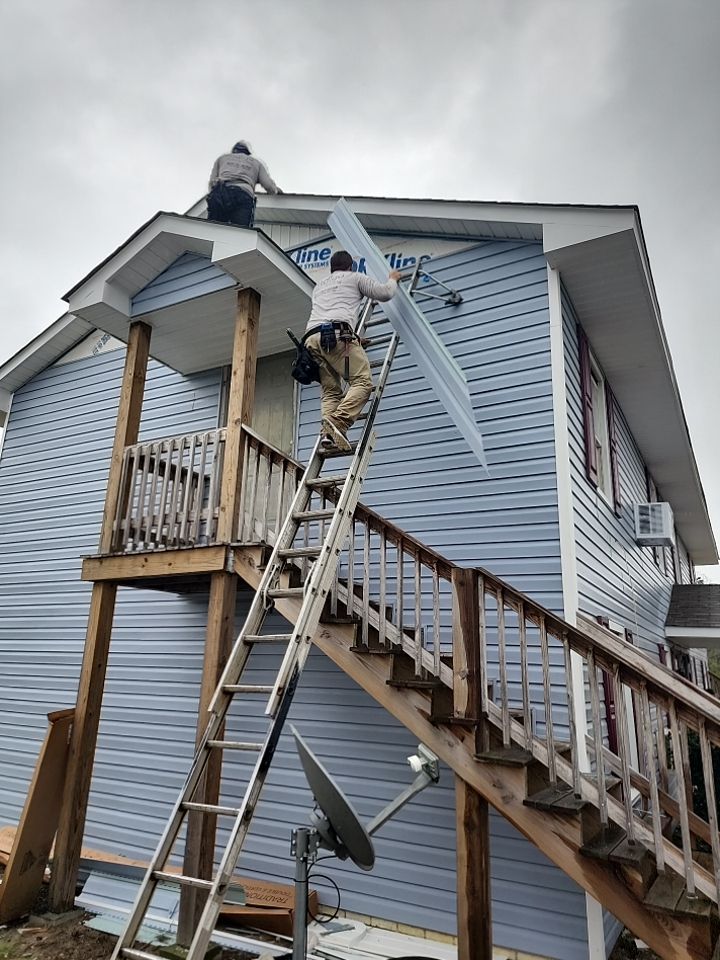Interior and exterior renovation using Royal Building Products  by Indigo State Roofing