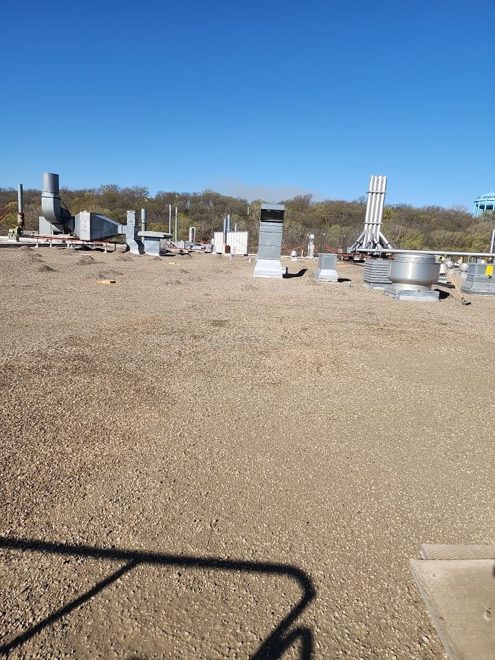 AML Riverside  by Grell Roofing, LLC