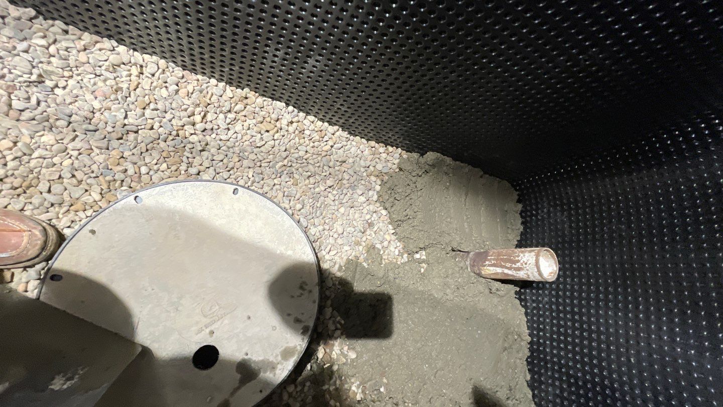 Interior Drain Tile & Sump Pump System in West Minneapolis by Waterproofing Northeast
