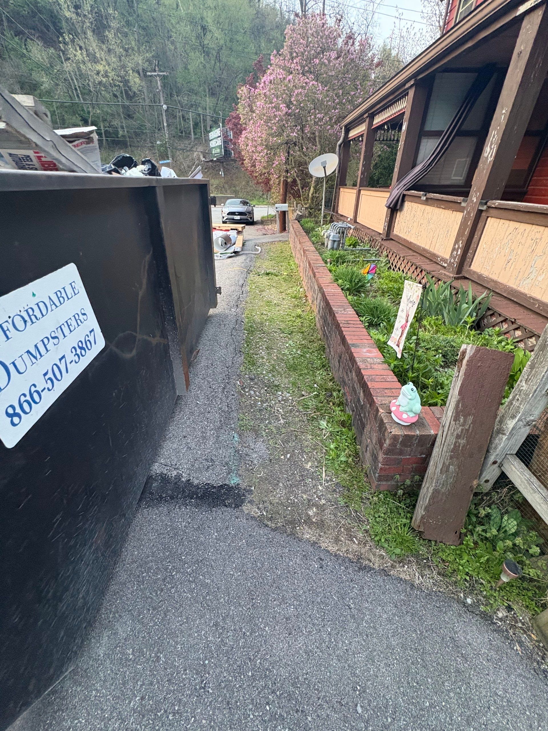 Roof sunspace deck  by Cousins Roofing Siding & Decks