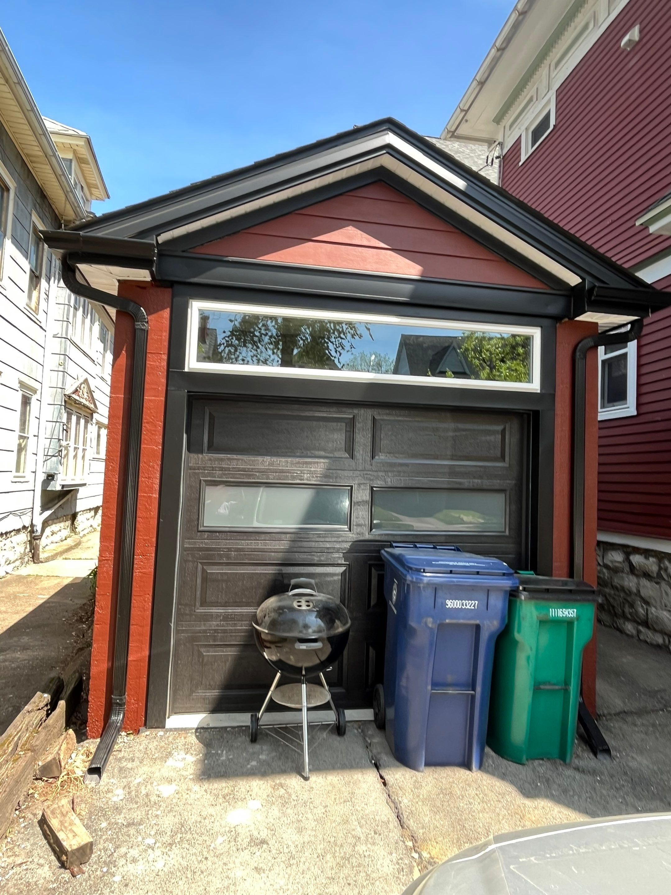 Exterior Renovations- Siding, Stamped Concrete, Porch, and Railings by Ivy Lea Construction