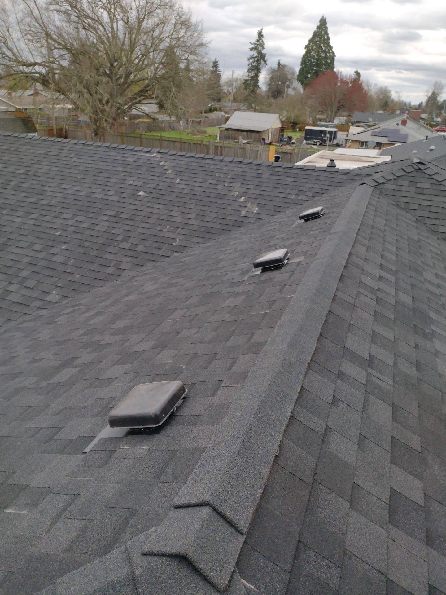 Residential Roofing Installation using IKO Dynasty (Color: Granite Black) by Orezona Building & Roofing Company, Inc.