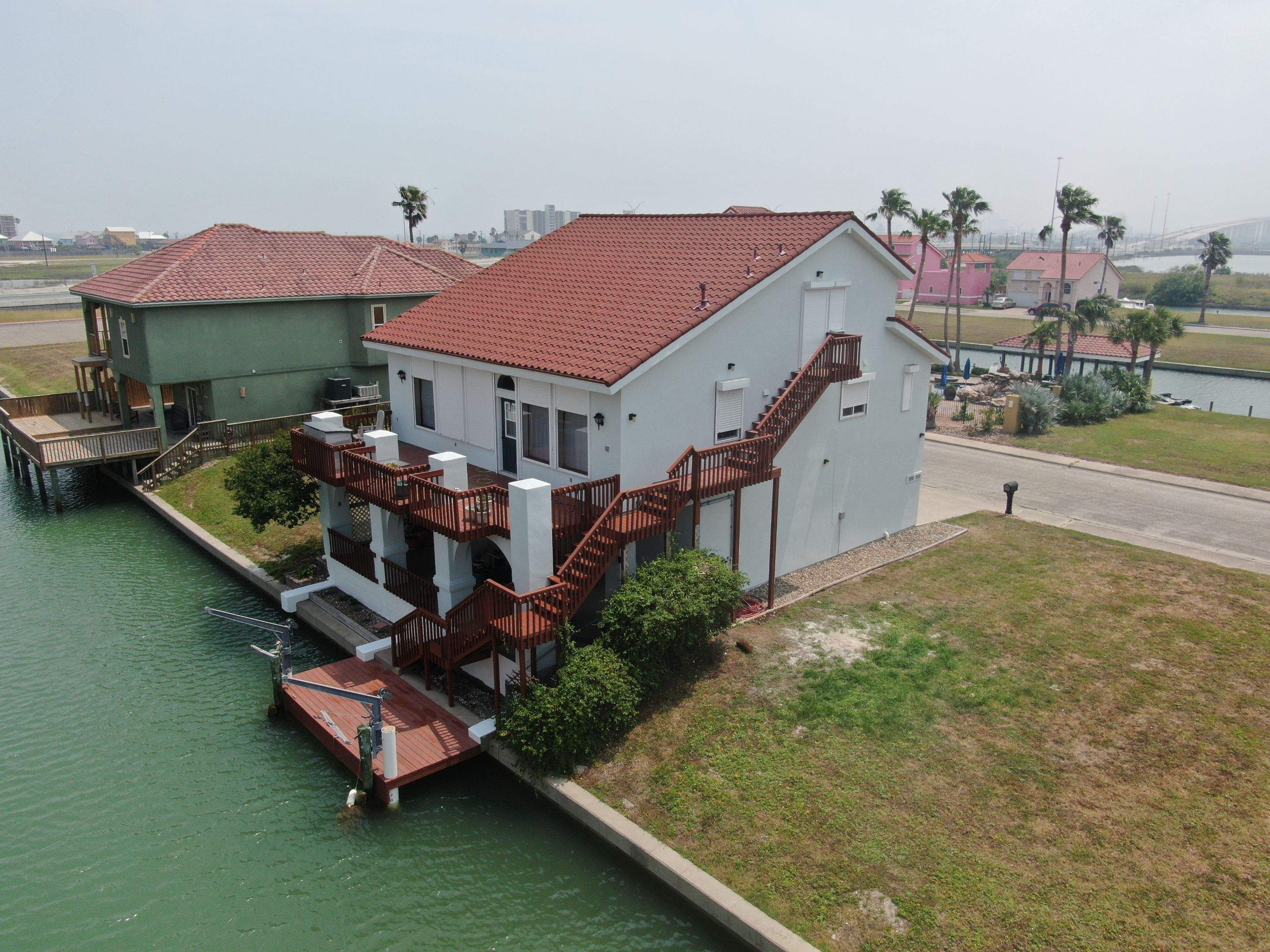 Waterfront Stucco Remastered by Bayfront Roofing and Construction