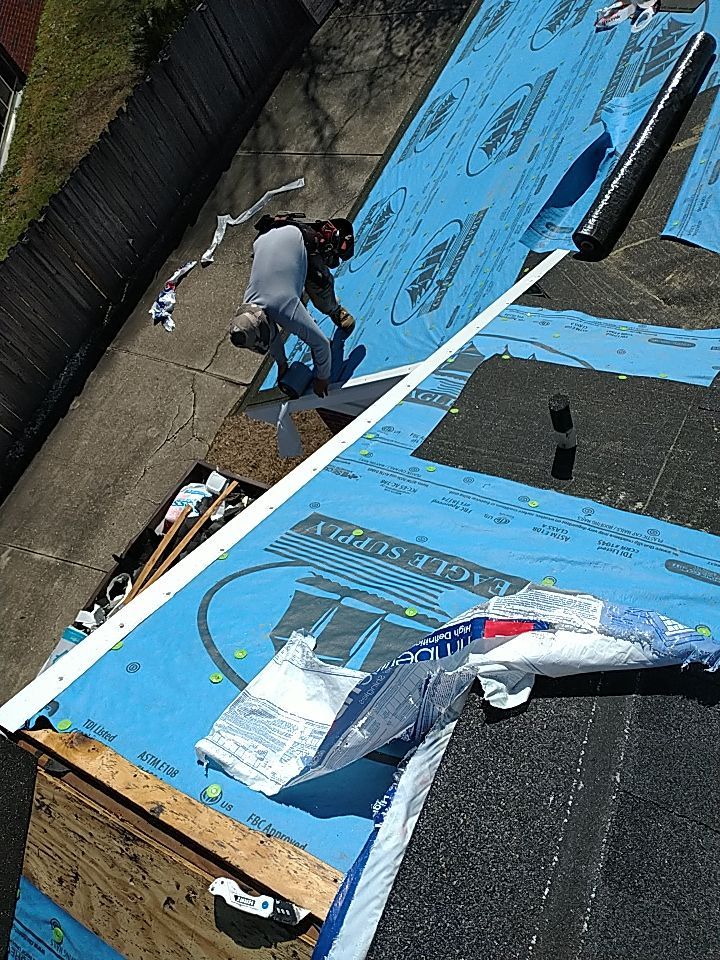 Residential Roofing Installation using Roof Replacement by American Roofing & Construction LLC