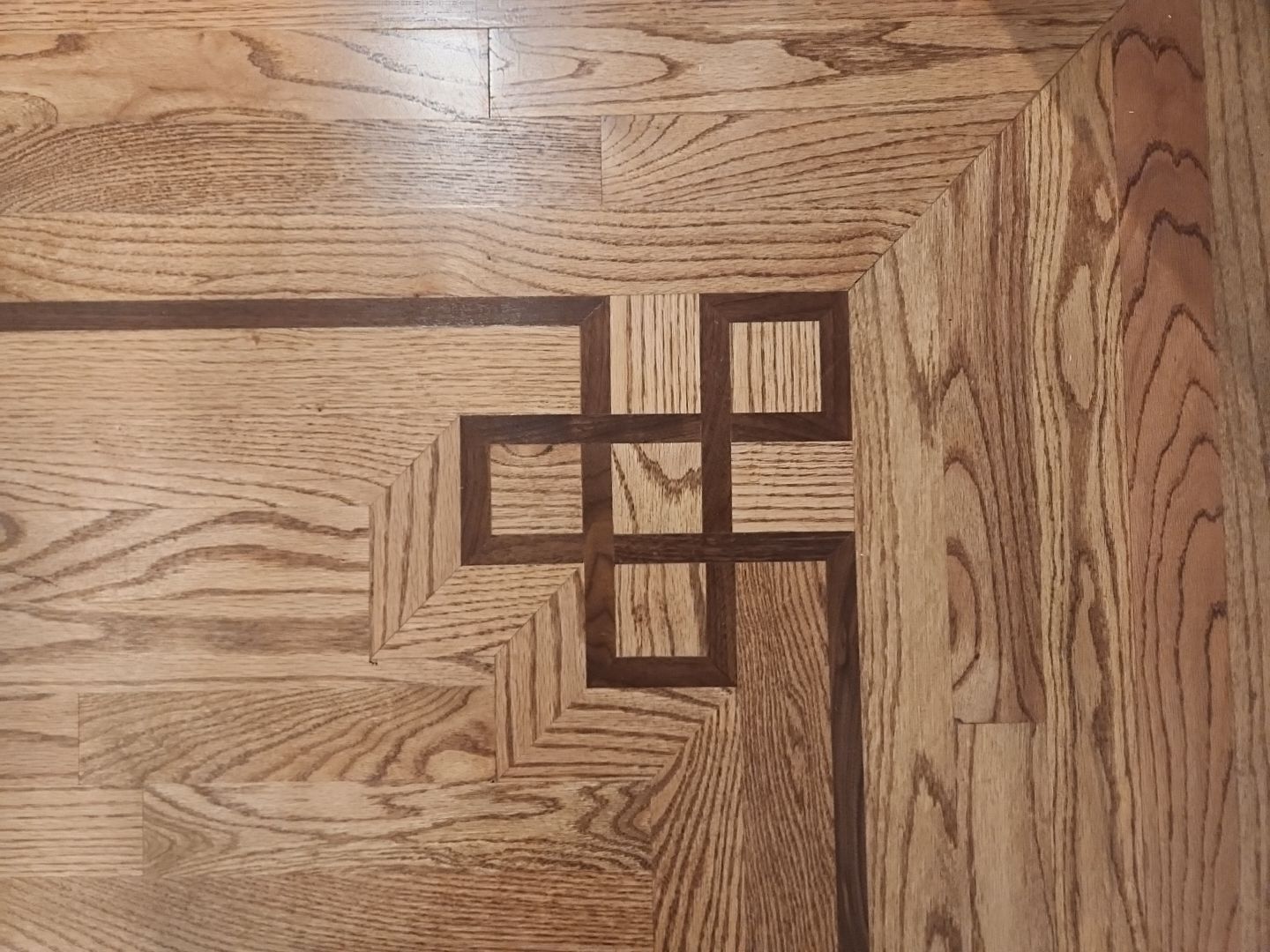 Ann Arbor Elegance: Red Oak and Walnut Living Room Masterpiece by Ann Arbor Hardwoods
