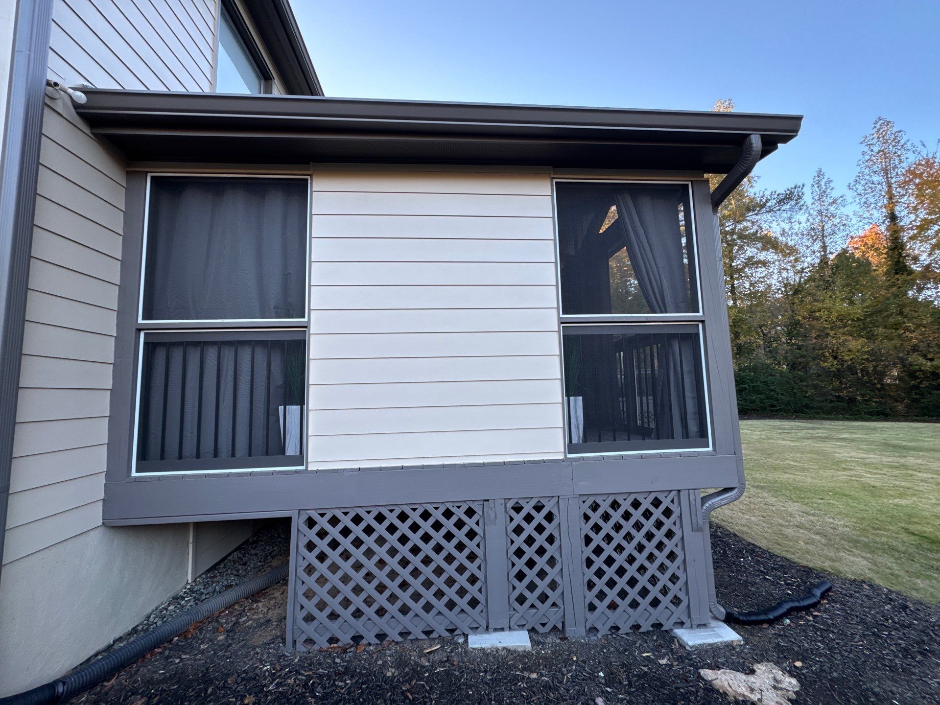 Custom Multi-Level Composite Deck and Screened-In Porch in Marietta by Swift Home Renovations