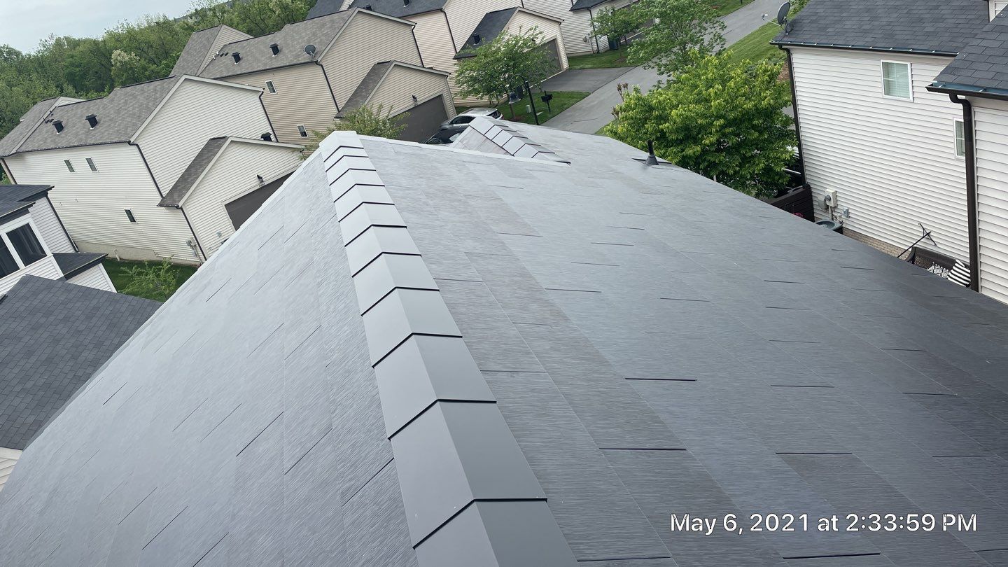 Tesla Solar Roof using Tesla Solar Roof V3 tiles by American Home Contractors