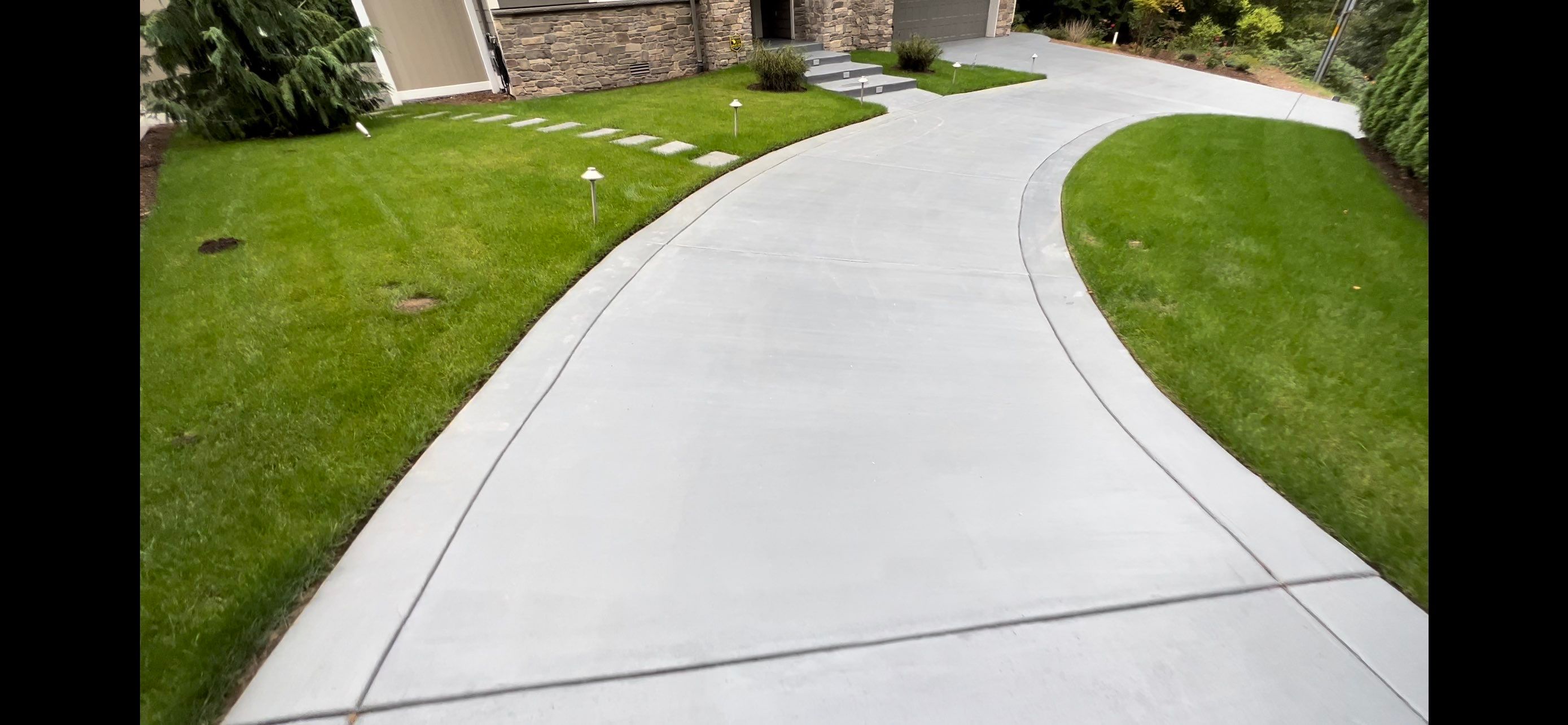Melanie | Concrete Driveway  by Jireh Asphalt & Concrete Inc 