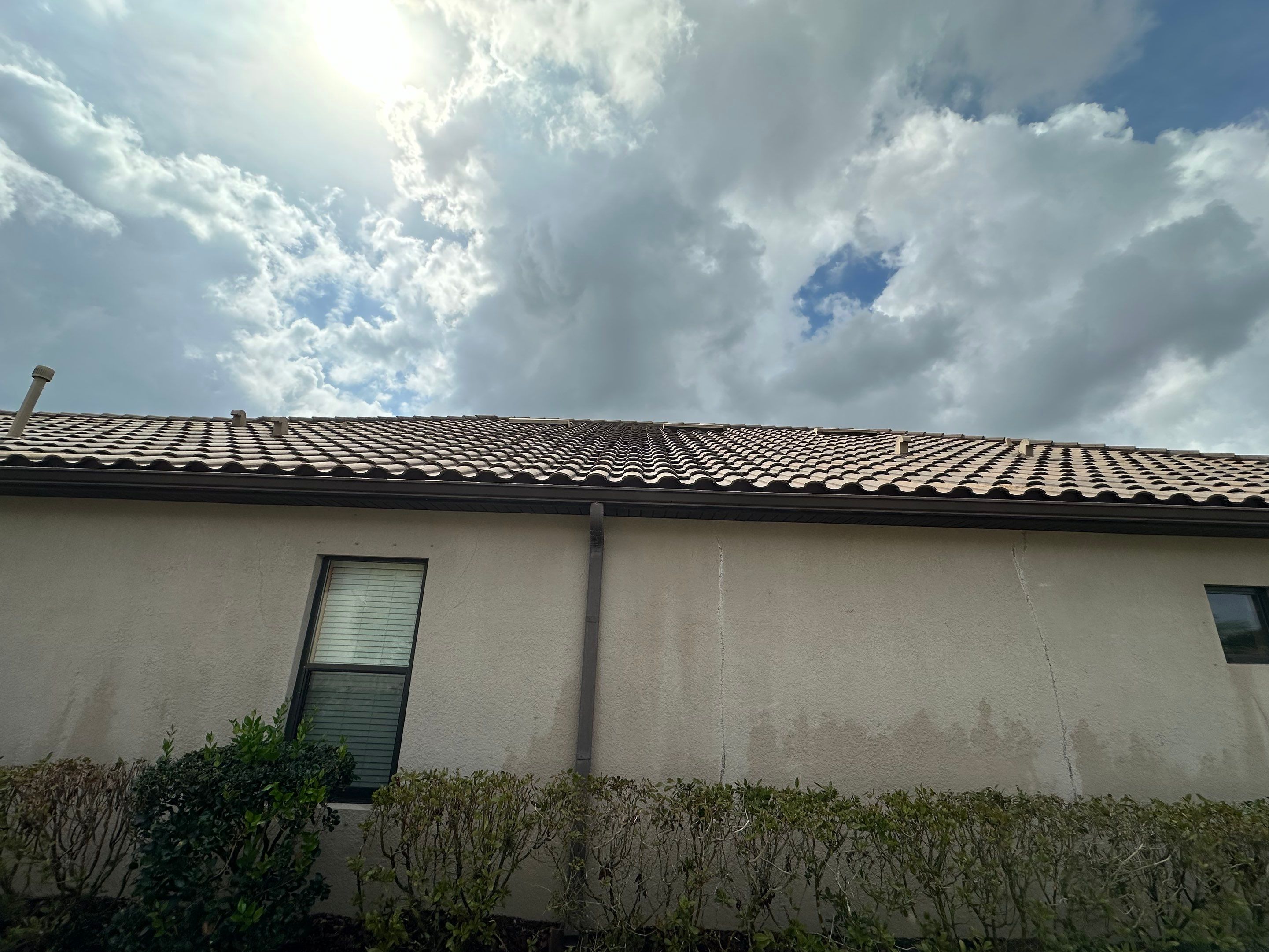 Concrete Tile Roof, Paver Pool Deck, Screen Enclosure & Driveway Cleaning in Artisan Lakes Esplanade, Palmetto, FL | Sunshine AquaWash by Sunshine AquaWash