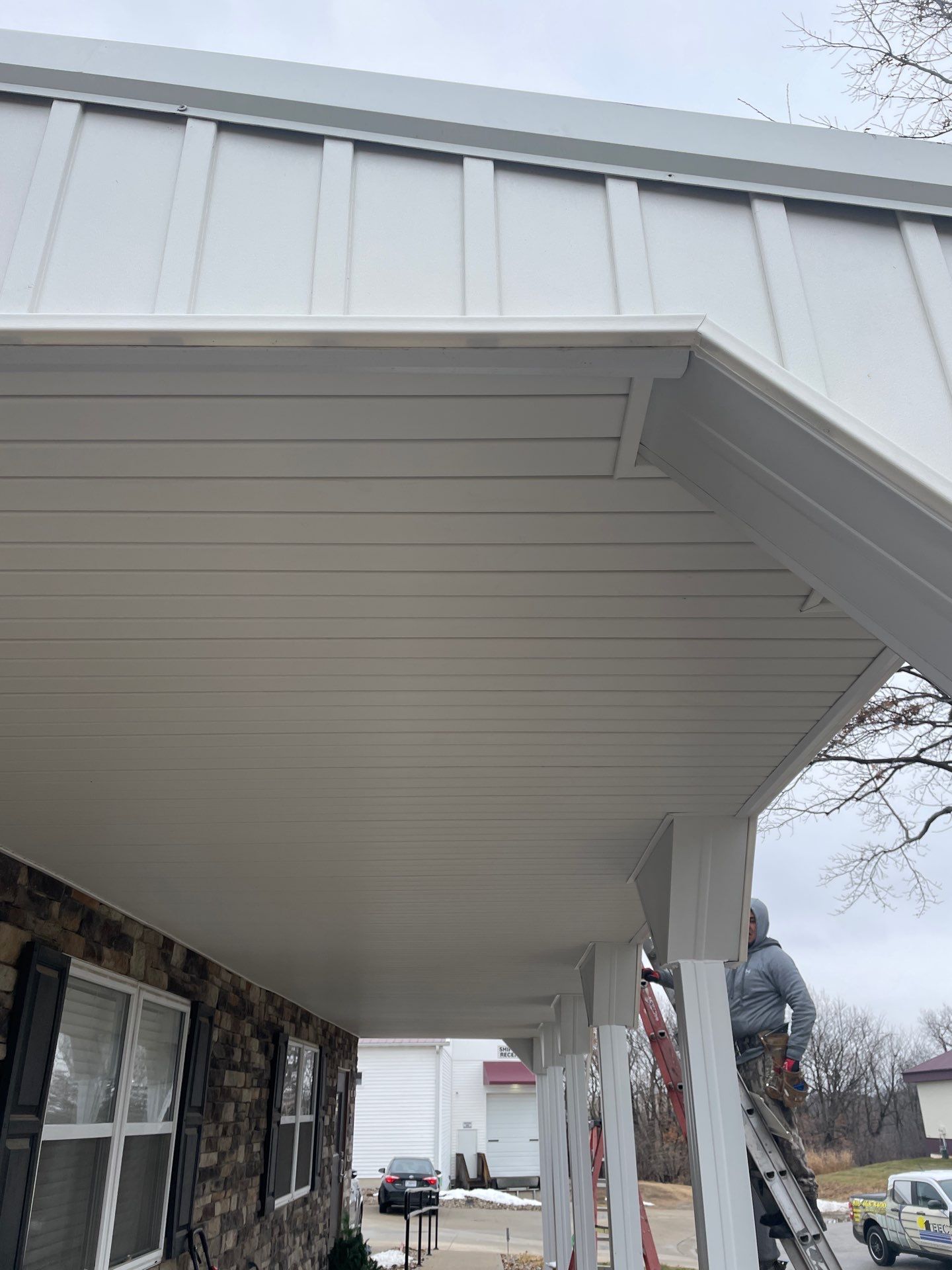 Siding and Stone Installation using Extrerior Porfolio Vinyl Siding and Versetta Stone by EEC  Windows, Siding & Roofing 