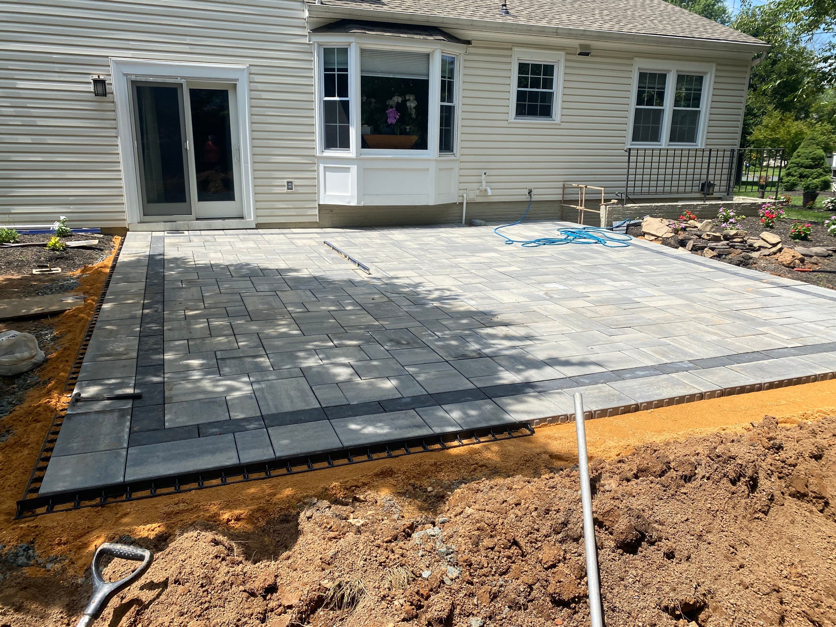 Backyard Transformation using Techo-Bloc Pavers by The Smet Companies, LLC