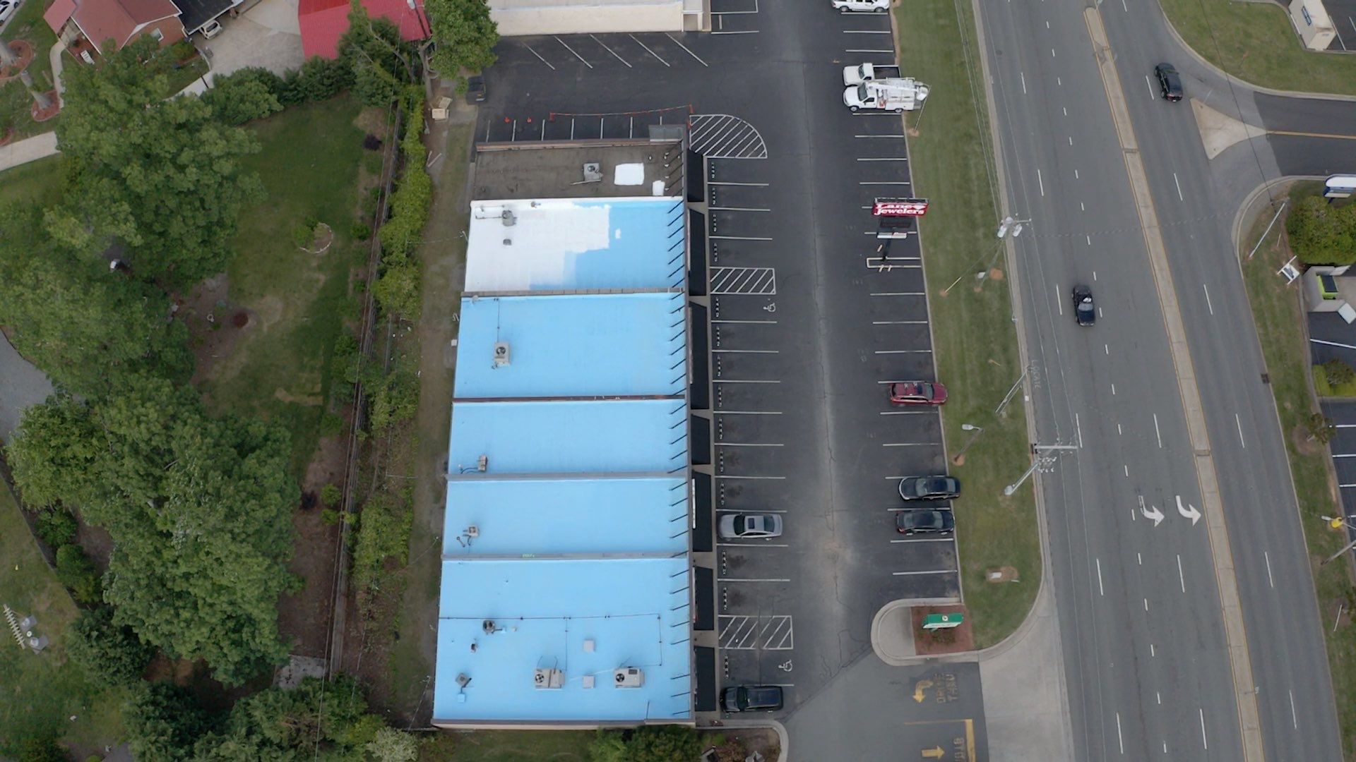 Commercial Roof Coating using Fiberseal basecoat and Silicon Topcoat by Just In Time Roofing and Restoration