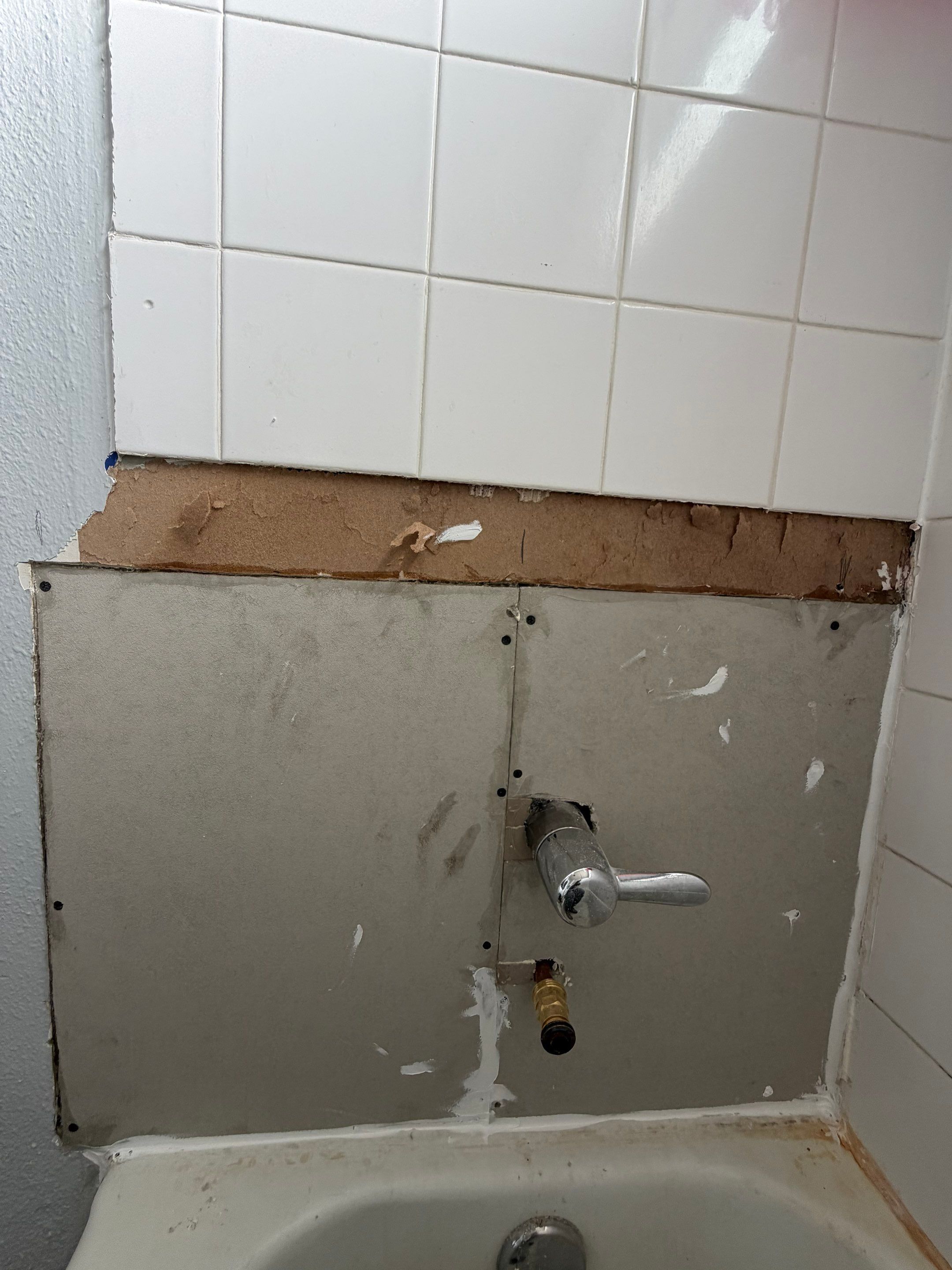 Shower Tile Repair by Handyman State LLC