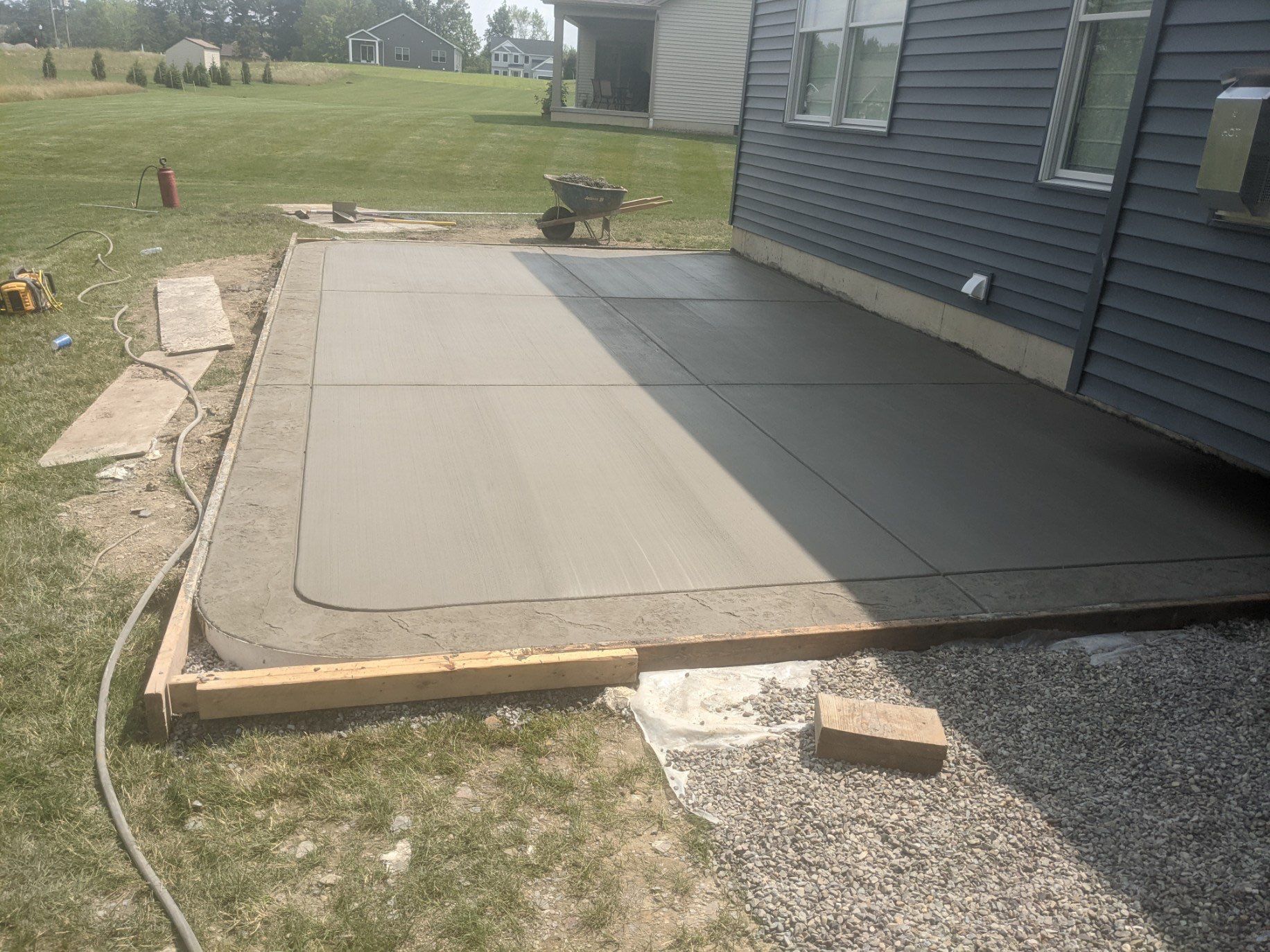 Outdoor Living- Deck and Concrete by Ivy Lea Construction