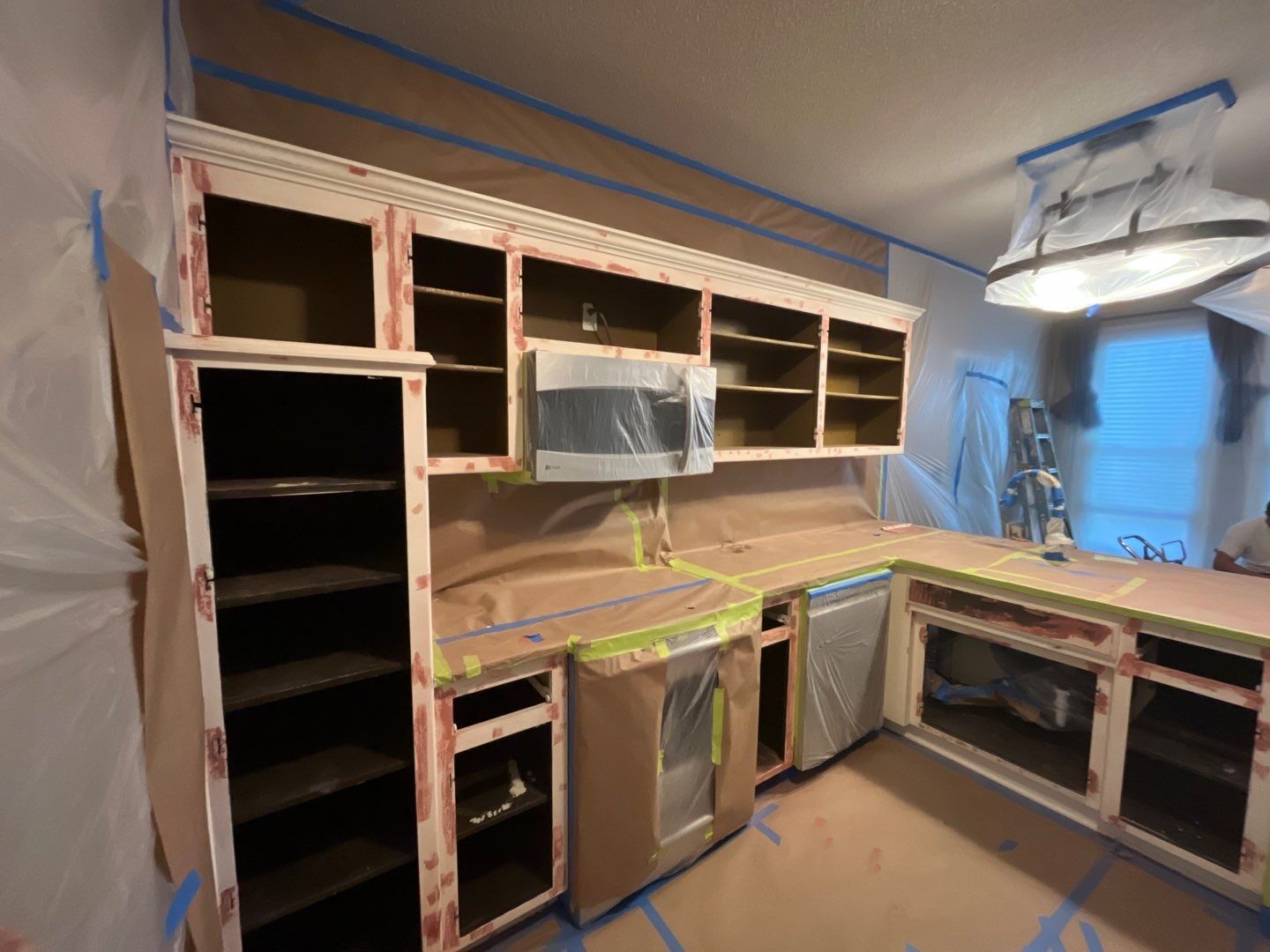 Cabinet Refresh – From Classic White to Modern Gray by Cougar Painting