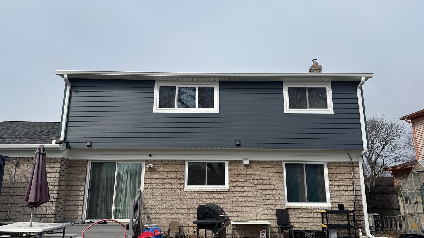 Siding Replacement using Alside Midnight Blue by 180 Contractors
