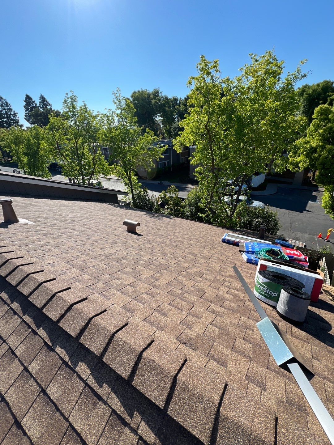 Removed tile from roof and replaced with shingles by Straight Edge Roofing Inc