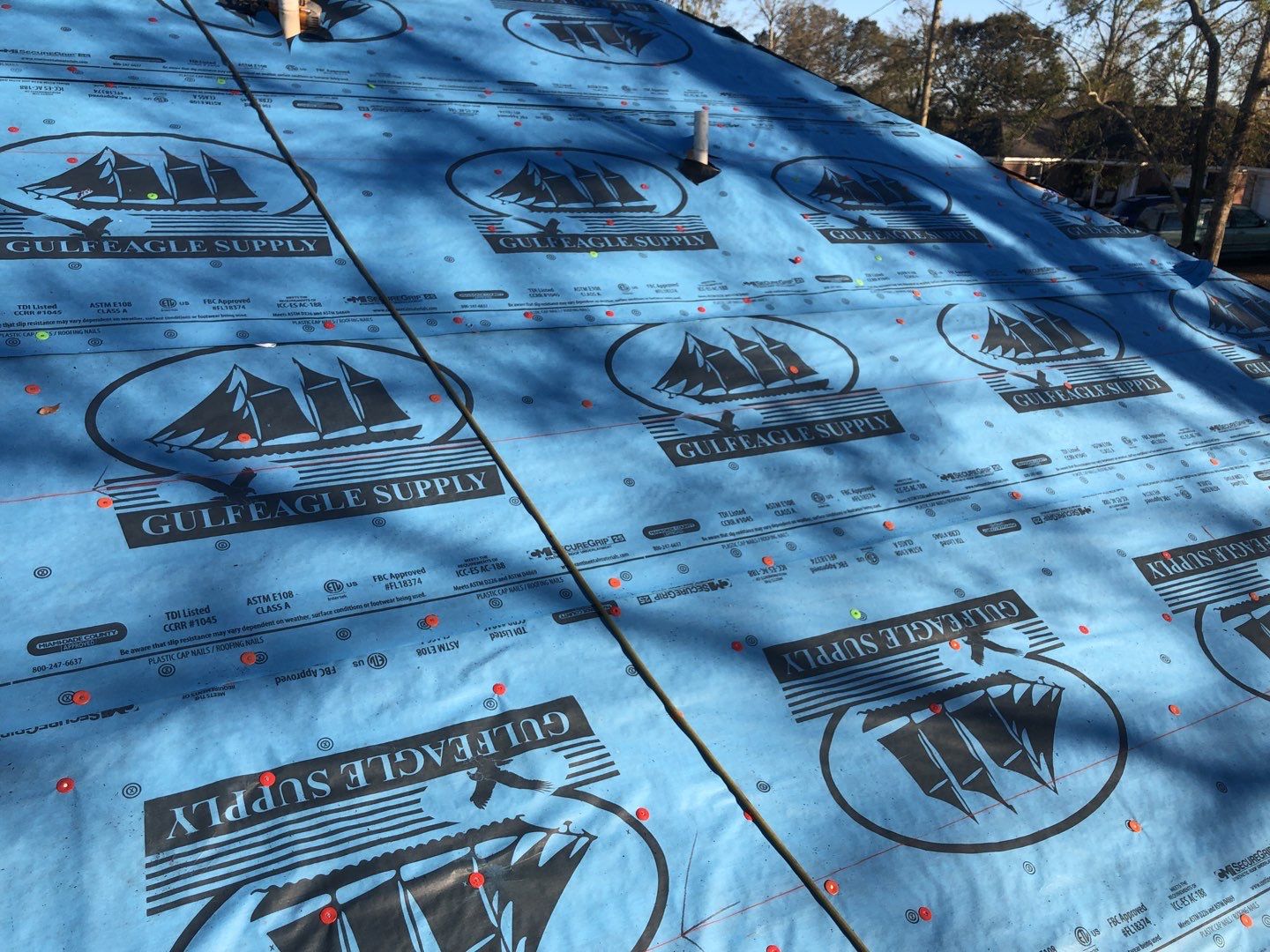 Residential Roofing Installation using Roof Replacement by American Roofing & Construction LLC