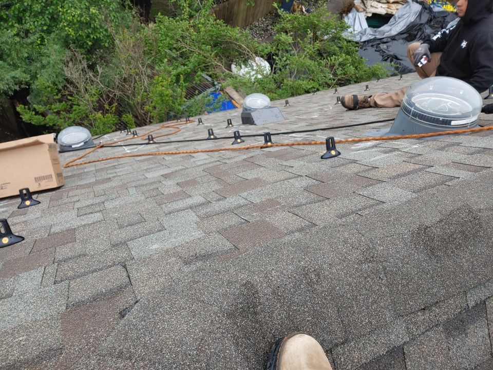 Residential Roof Replacement and Solar Panel Integration in Austin by Caliber Restoration LLC
