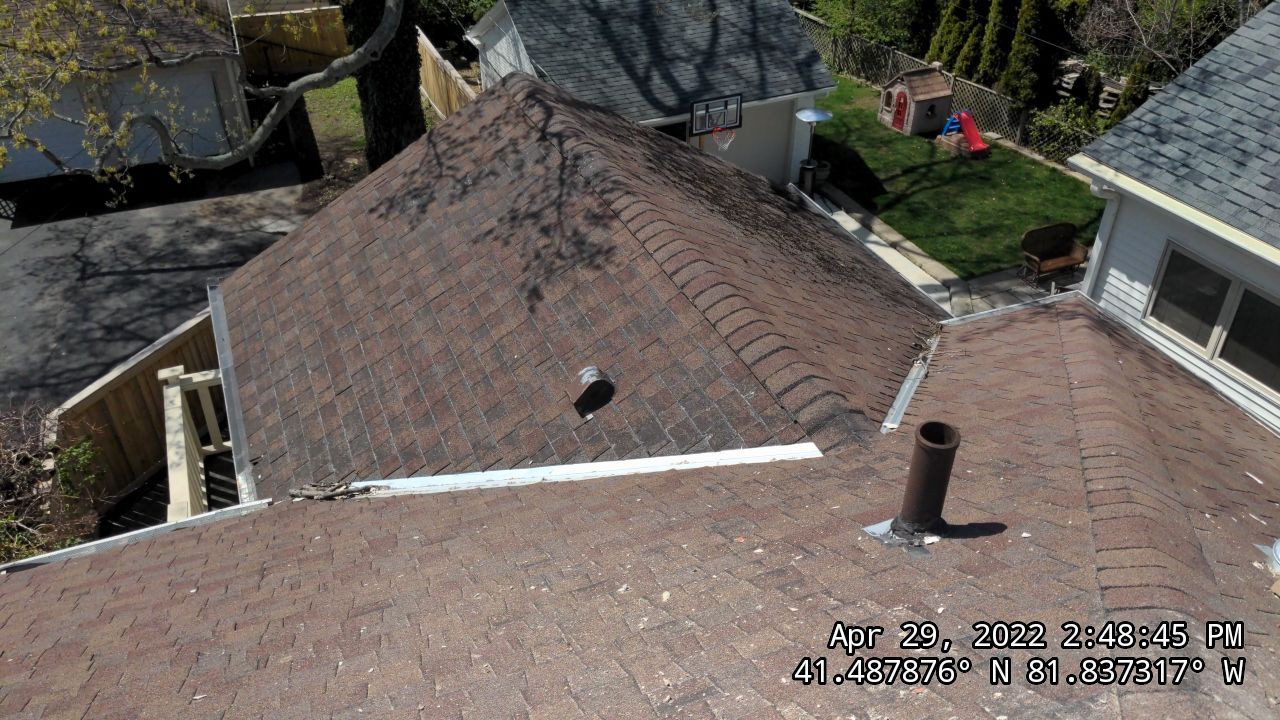 Residential Roofing Installation, Dec-tek walk-out porch roof, siding on garage by Absolute Roofing and Construction