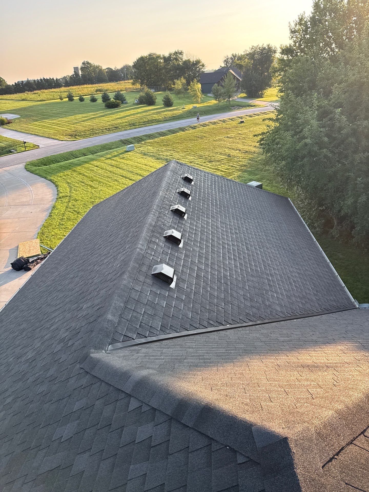 Rustic Black roof by Victor Construction