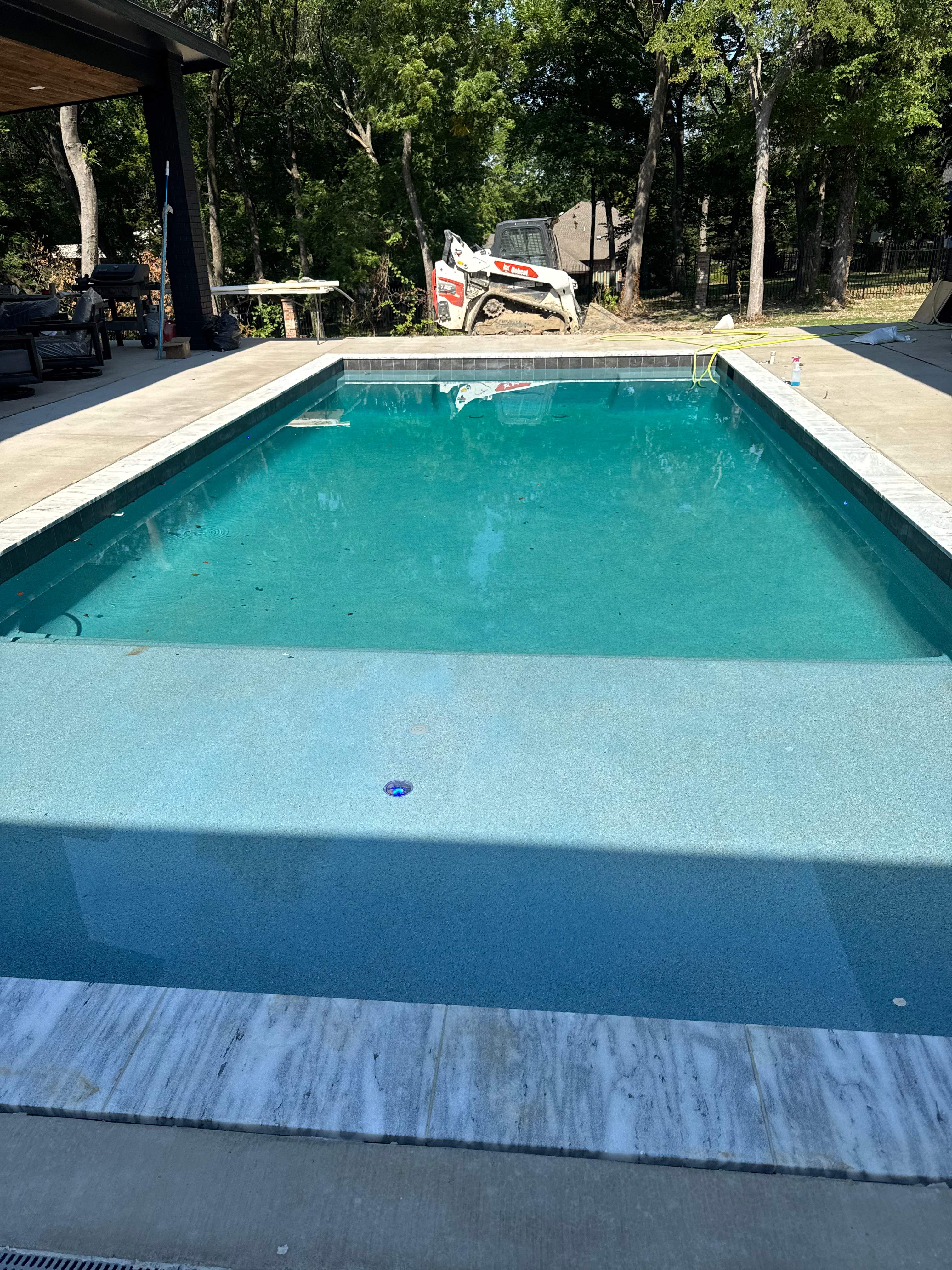 Modern Geometric Pool with Tanning Ledge by Pinnacle Pools and Spas - DFW